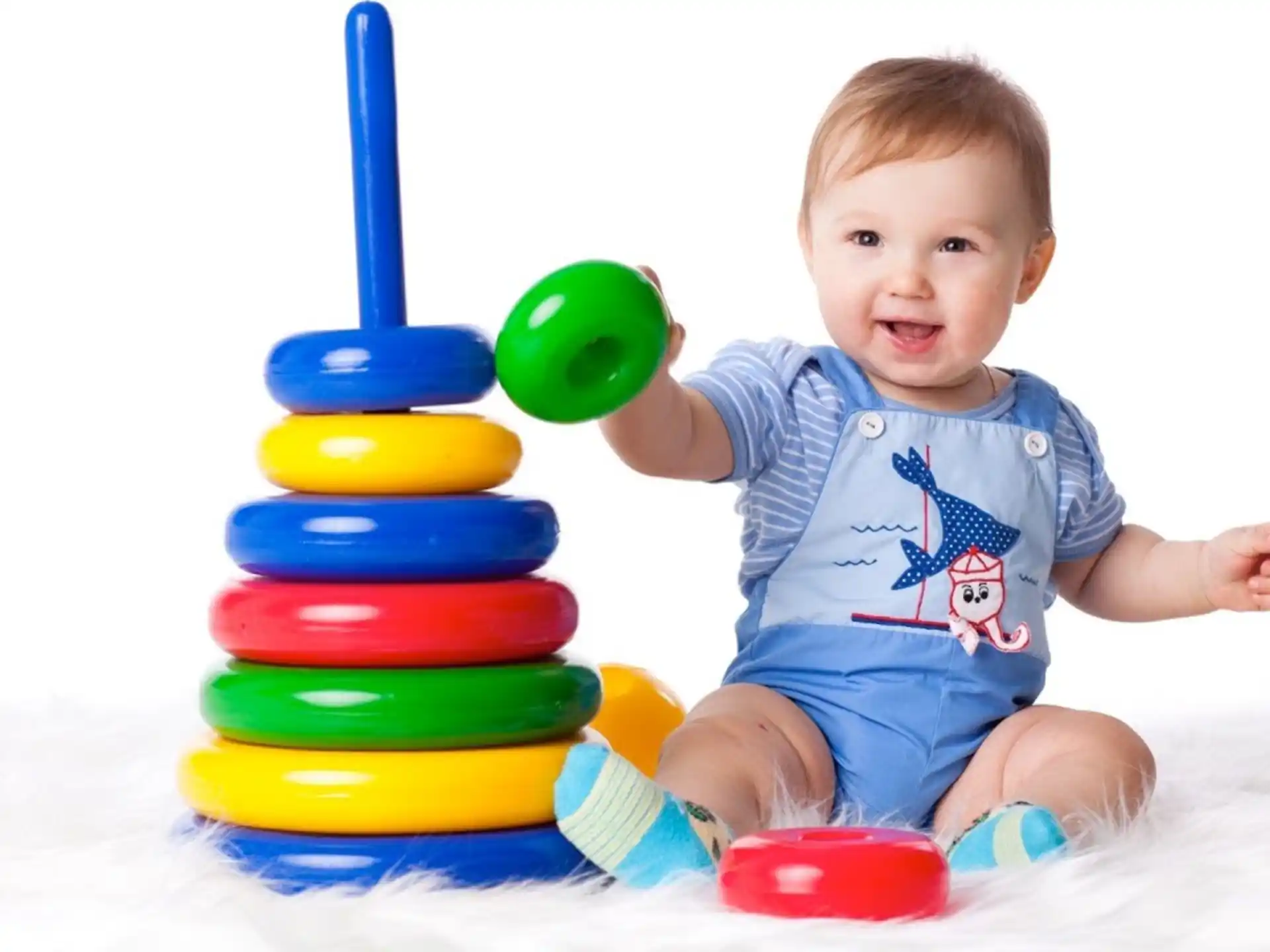 a baby playing with toys