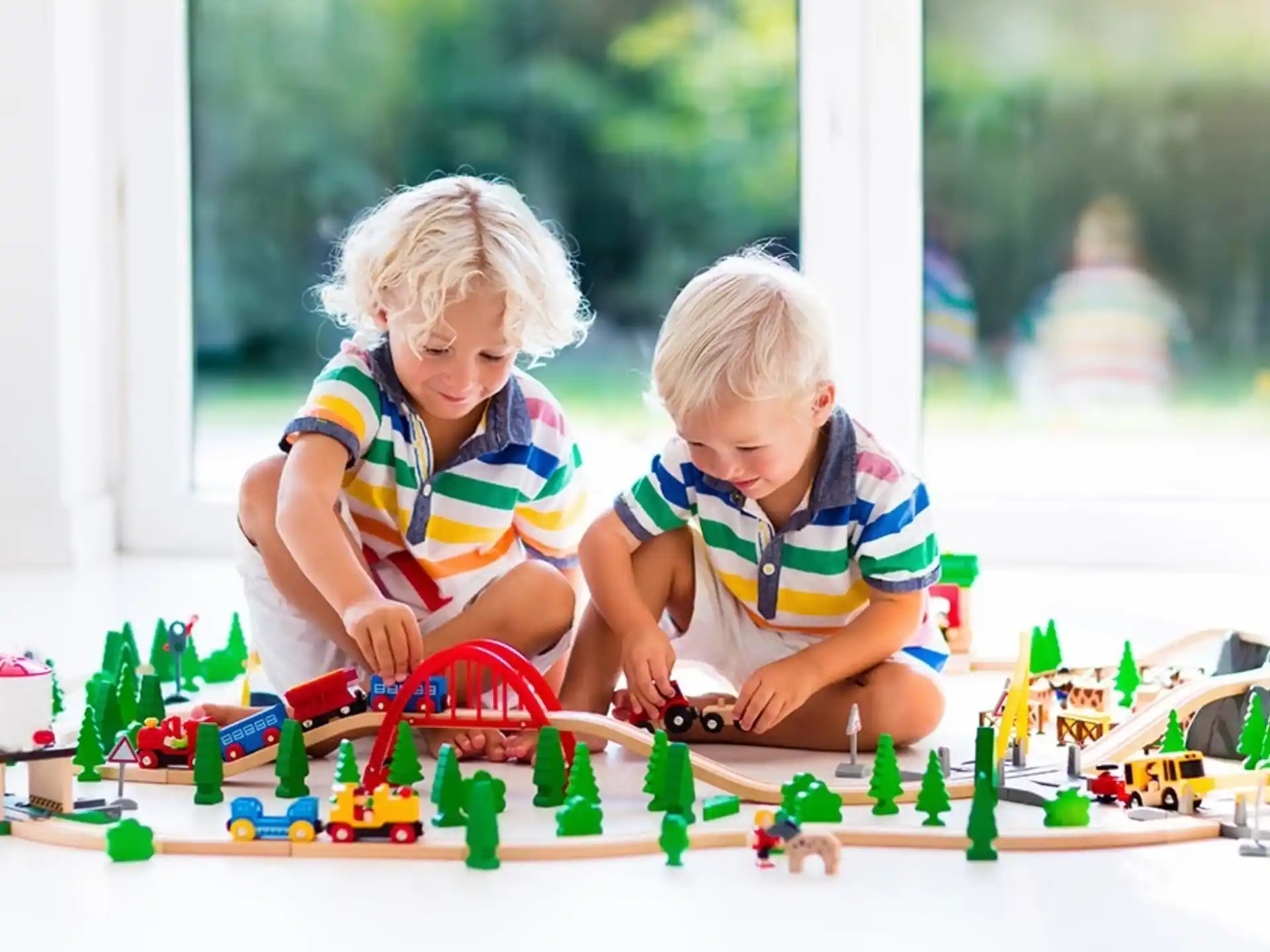 a couple of children playing with toys