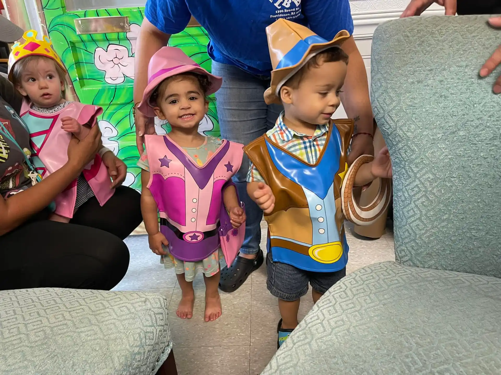 a group of children sitting on a couch