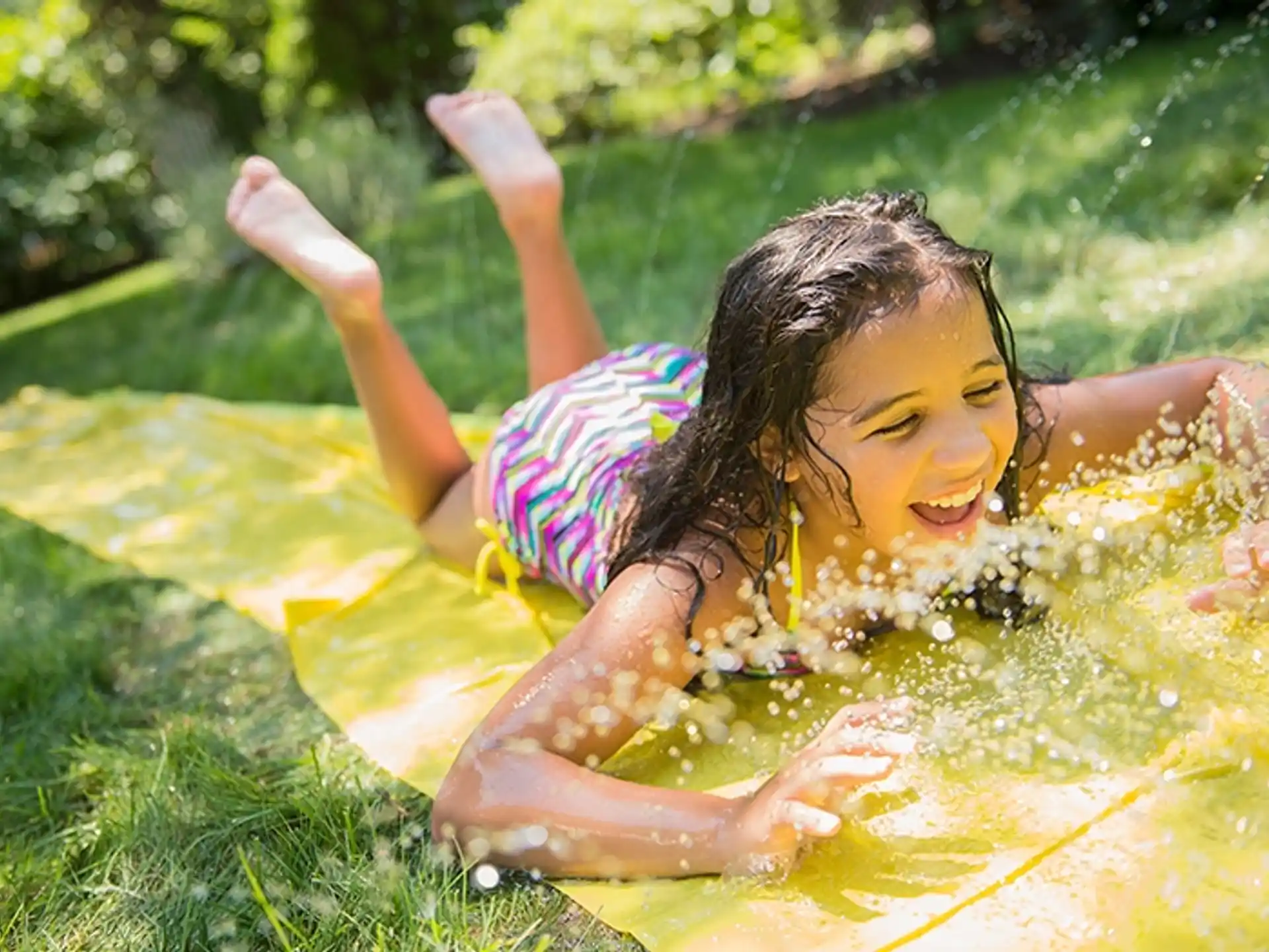 a girl lying in a hot tub