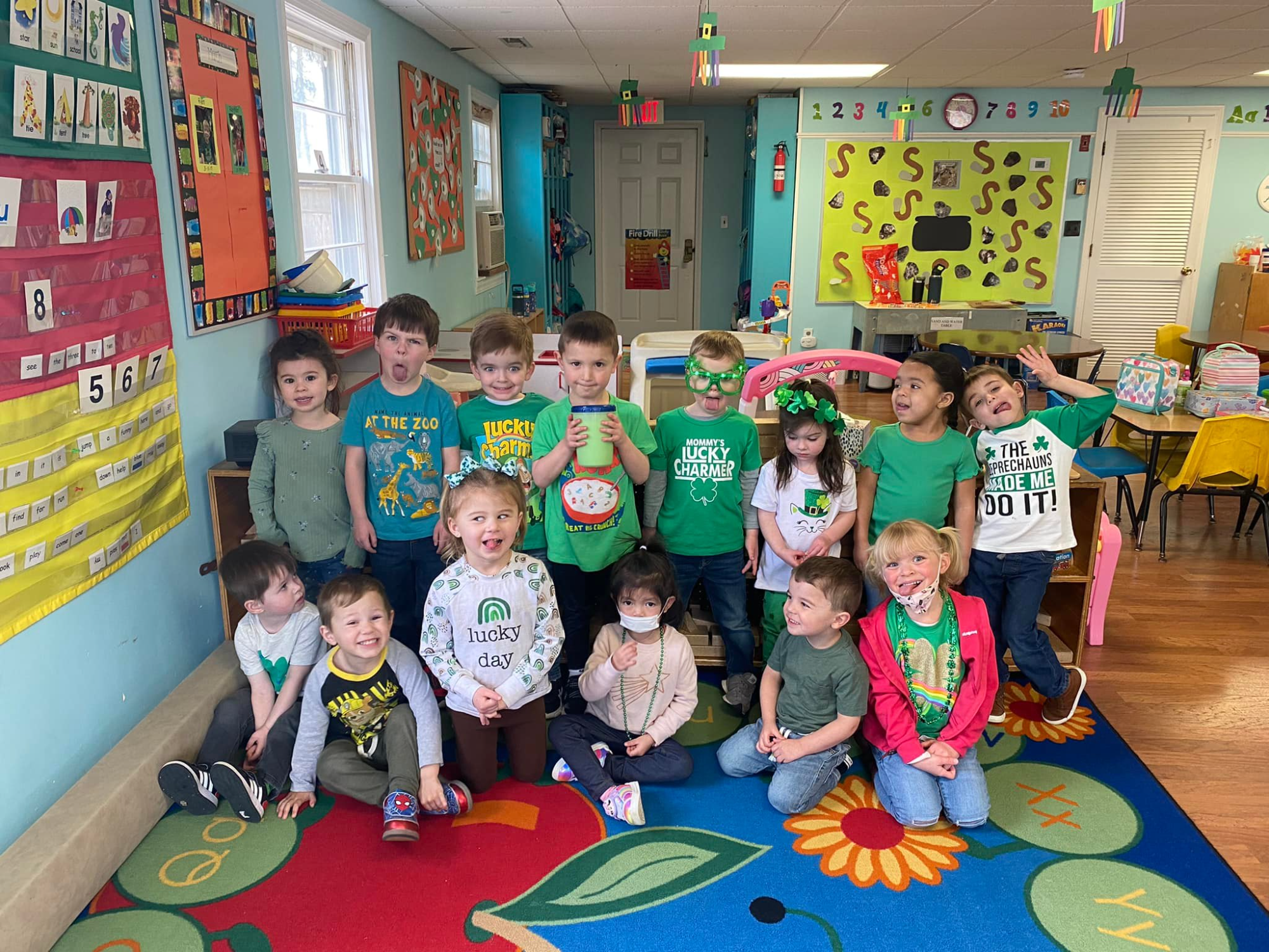 a group of children posing for a photo