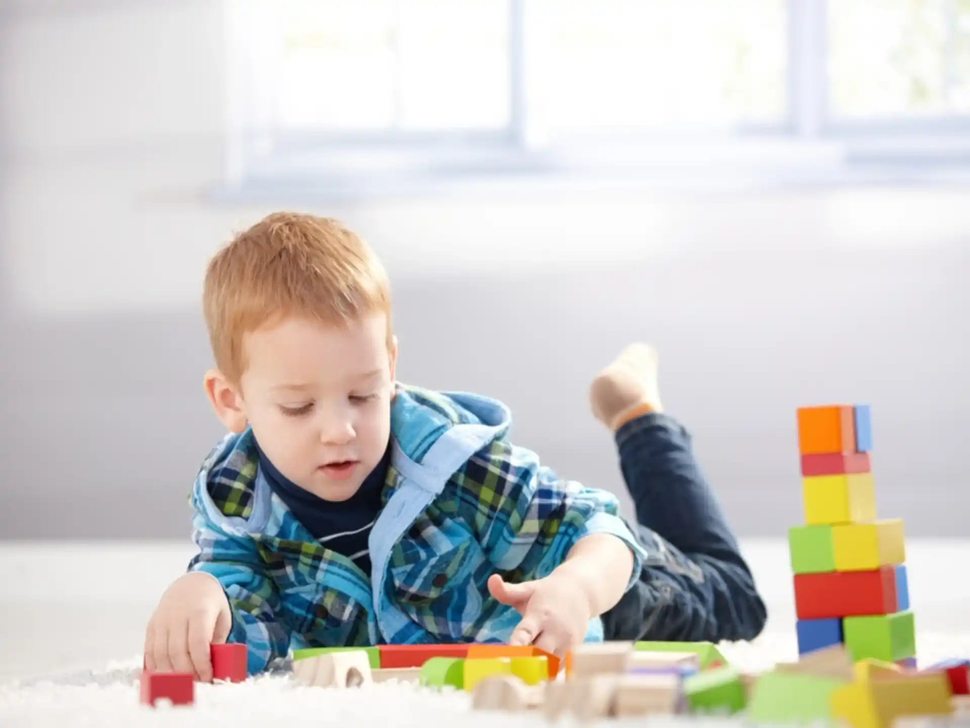 a baby playing with toys