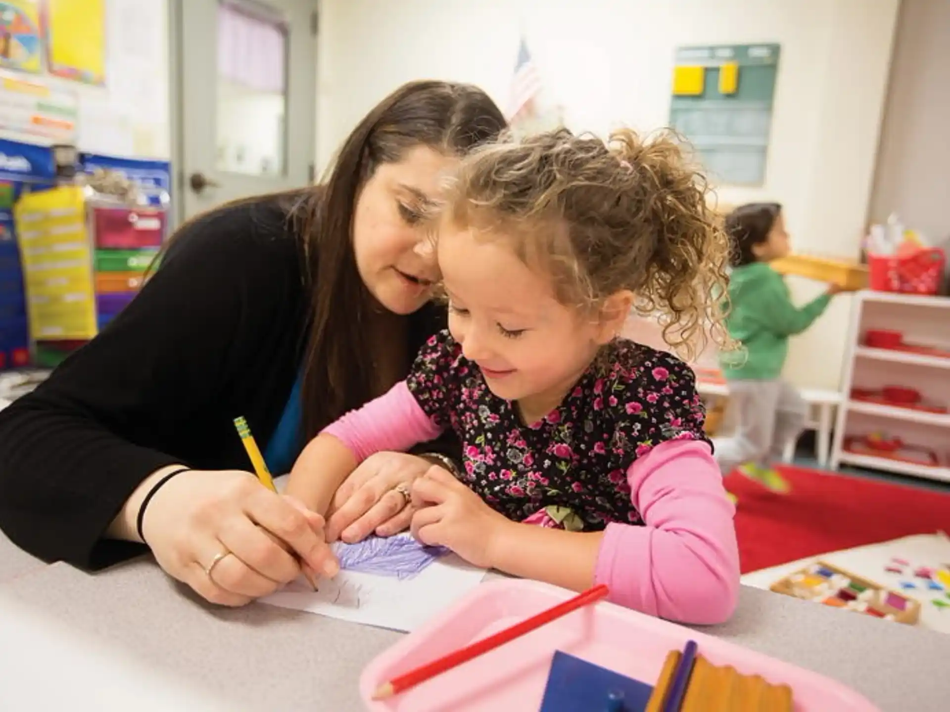 a person and a child coloring