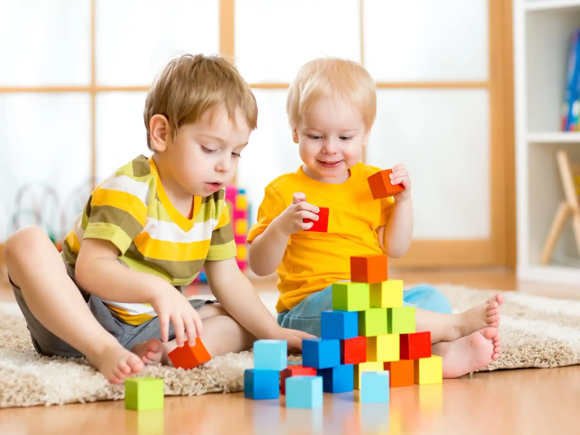 two children playing with toys