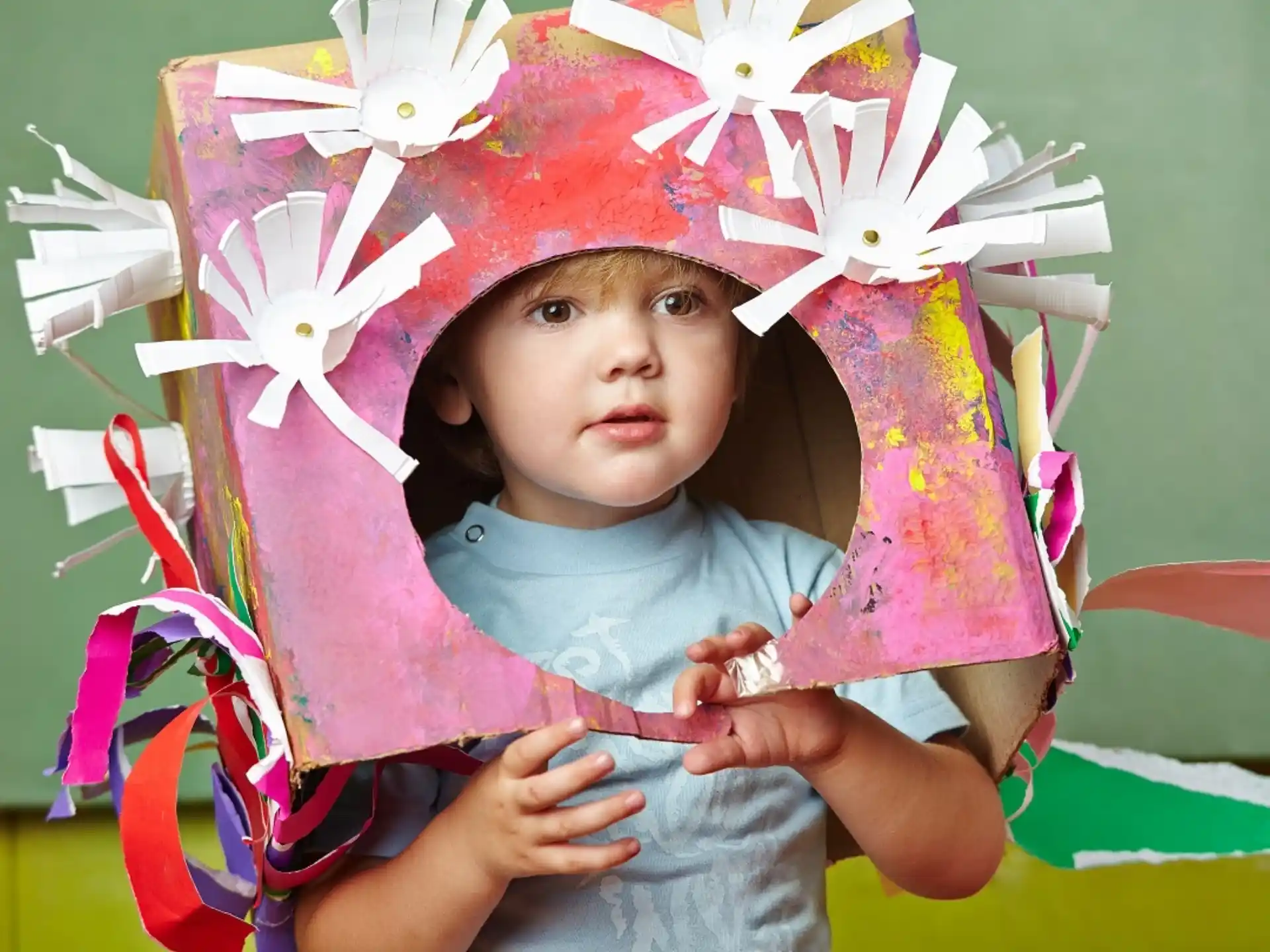 a baby wearing a pink hat