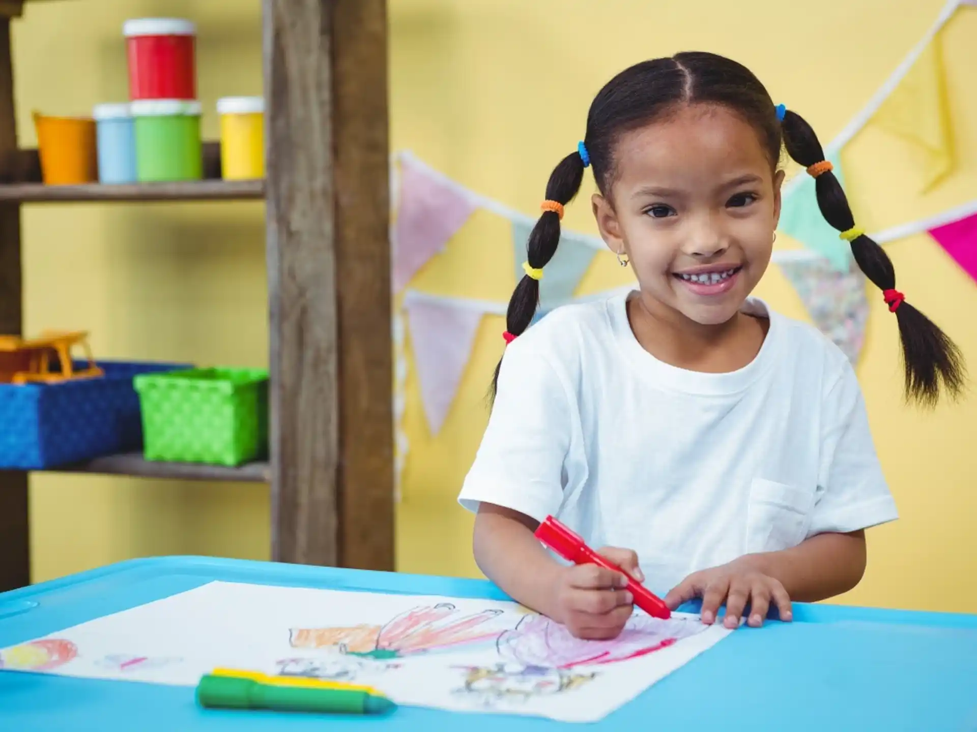 a young girl painting