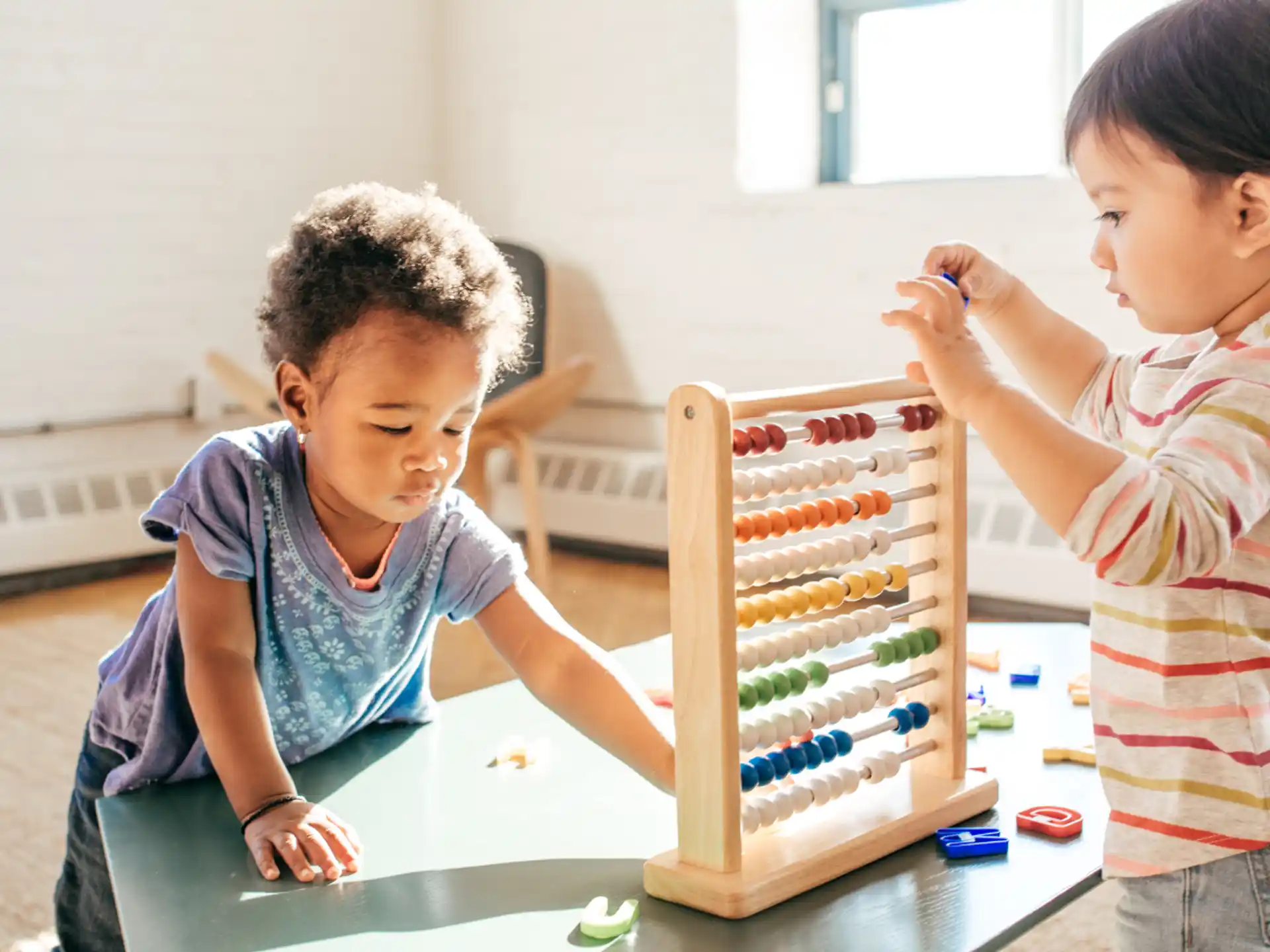 a few children playing with a toy