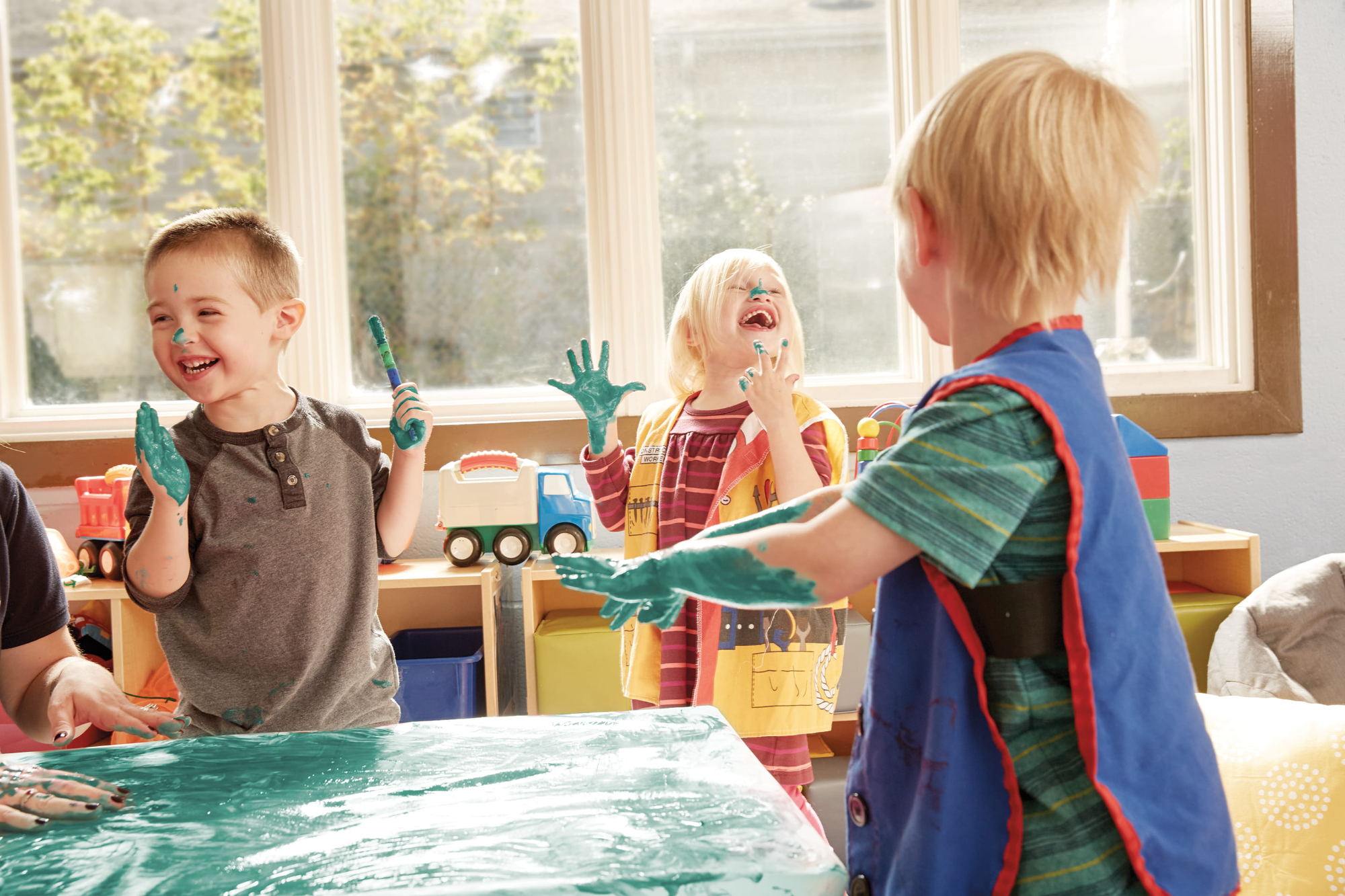 a group of kids playing with toys