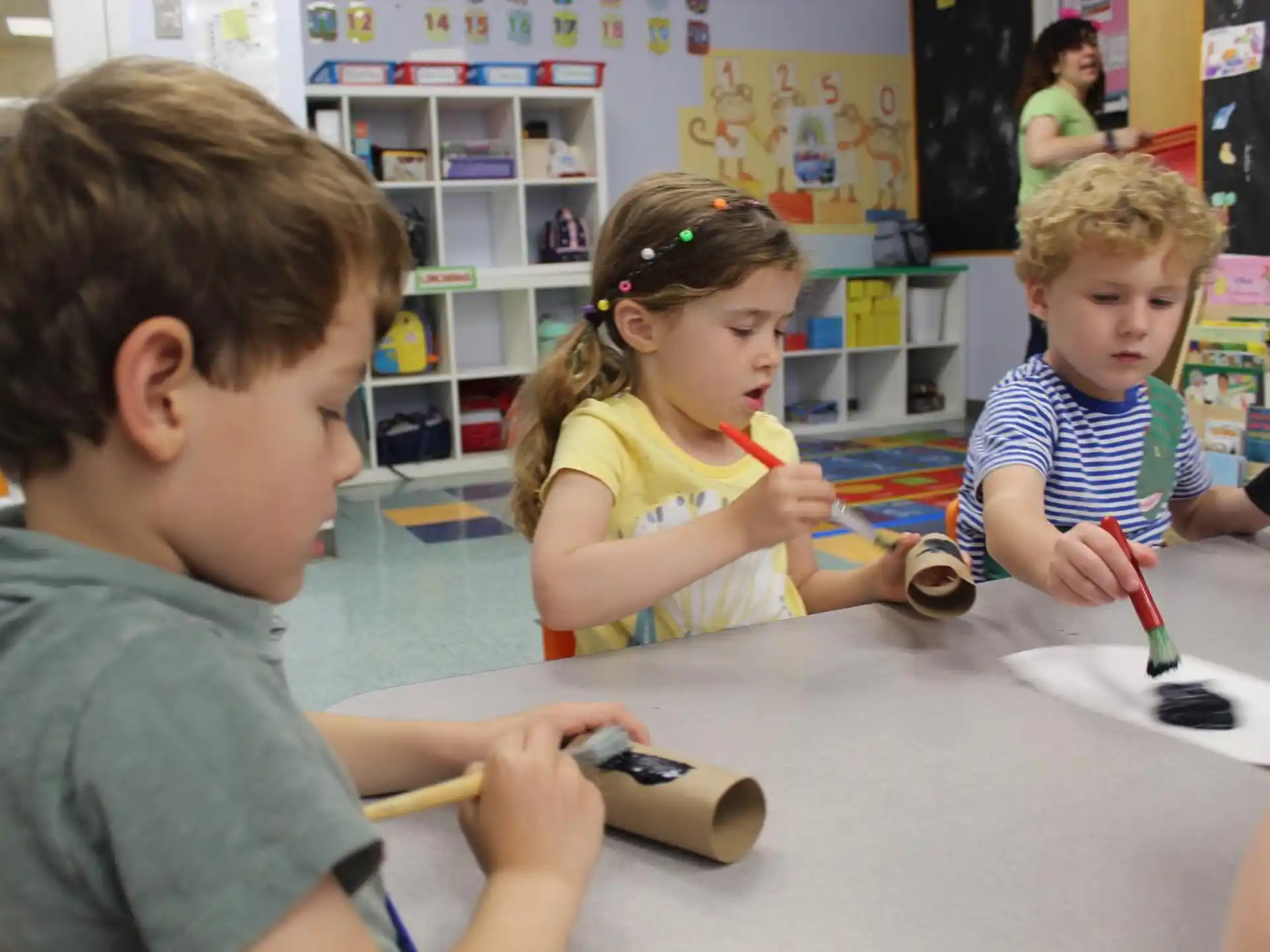 a group of children playing with a toy