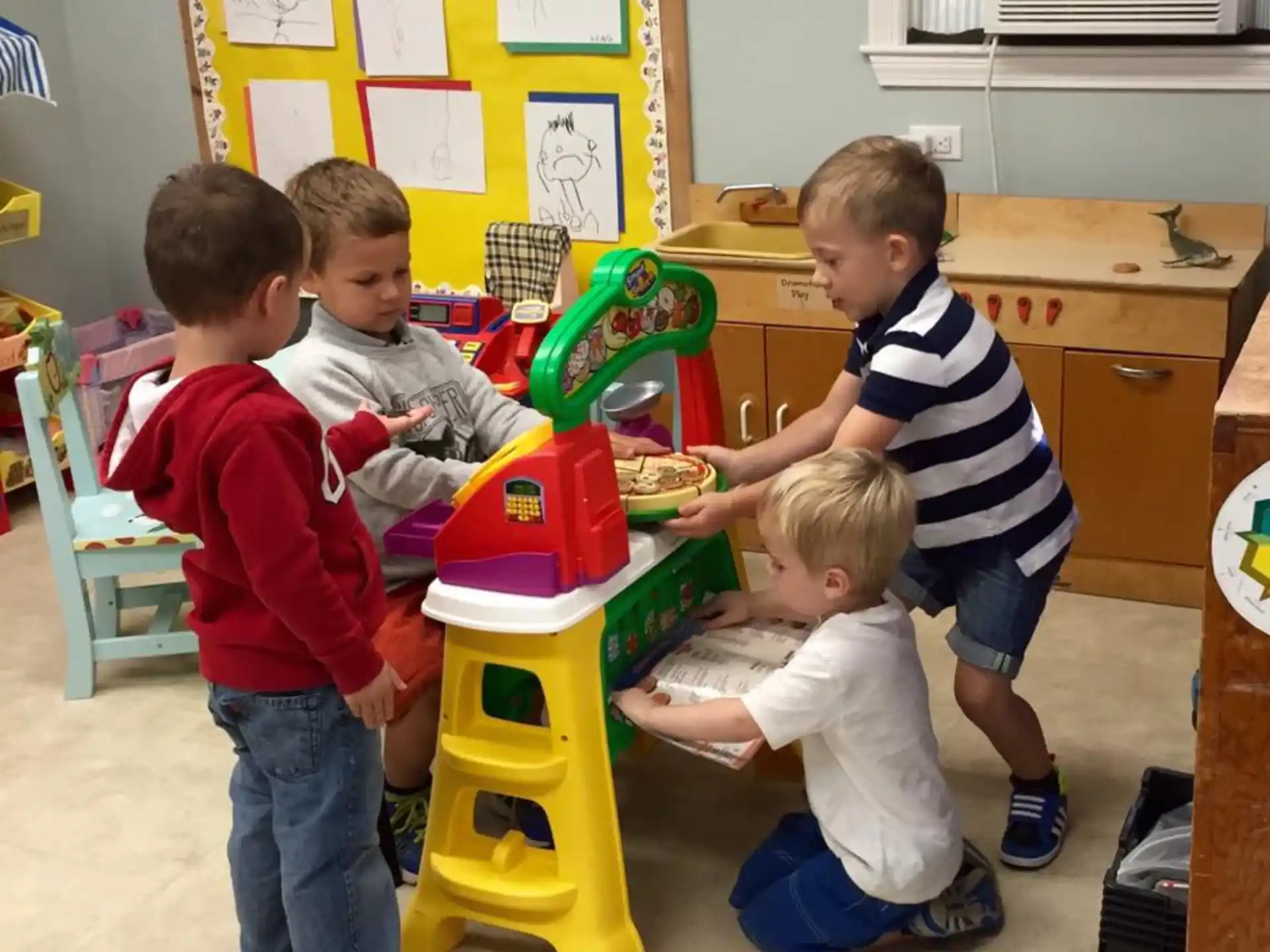 a group of children playing with toys