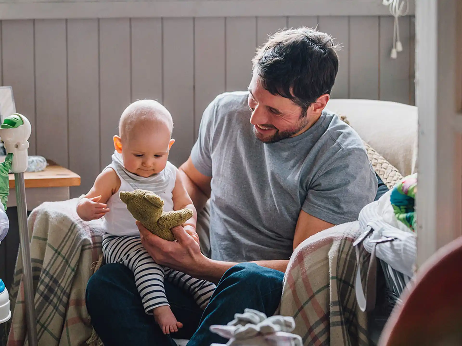a man holding a baby