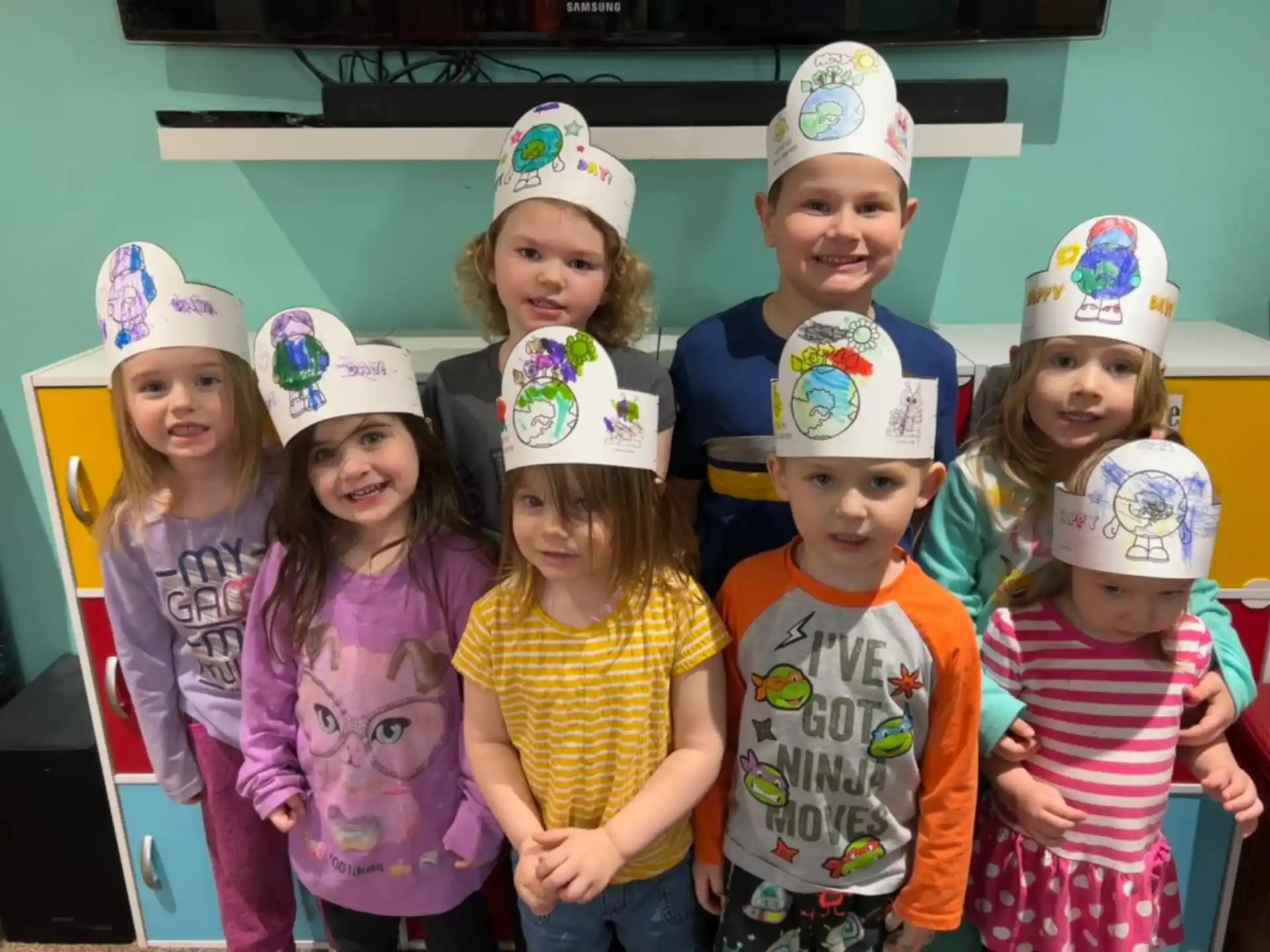 a group of children wearing hats