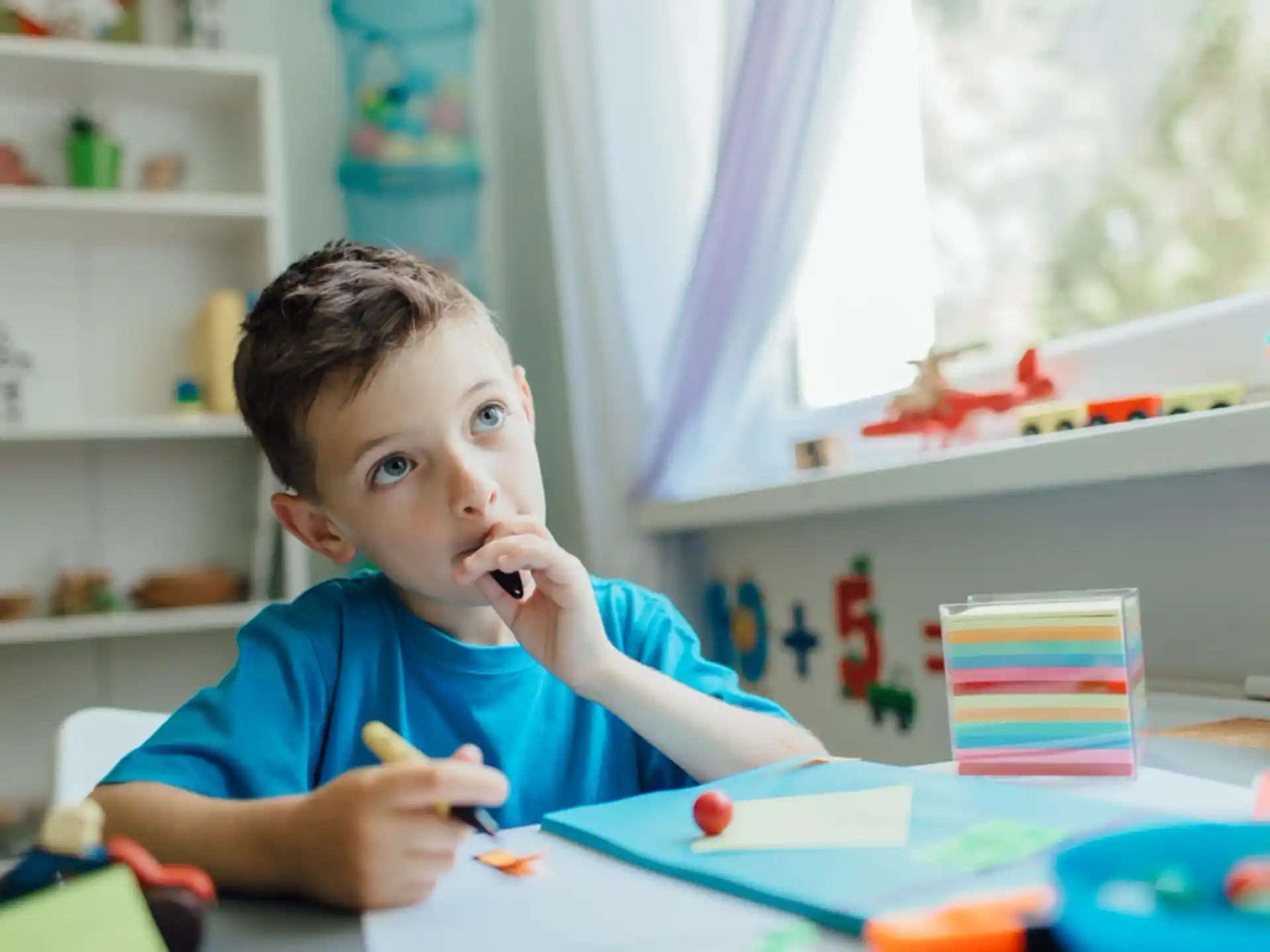 a boy brushing his teeth