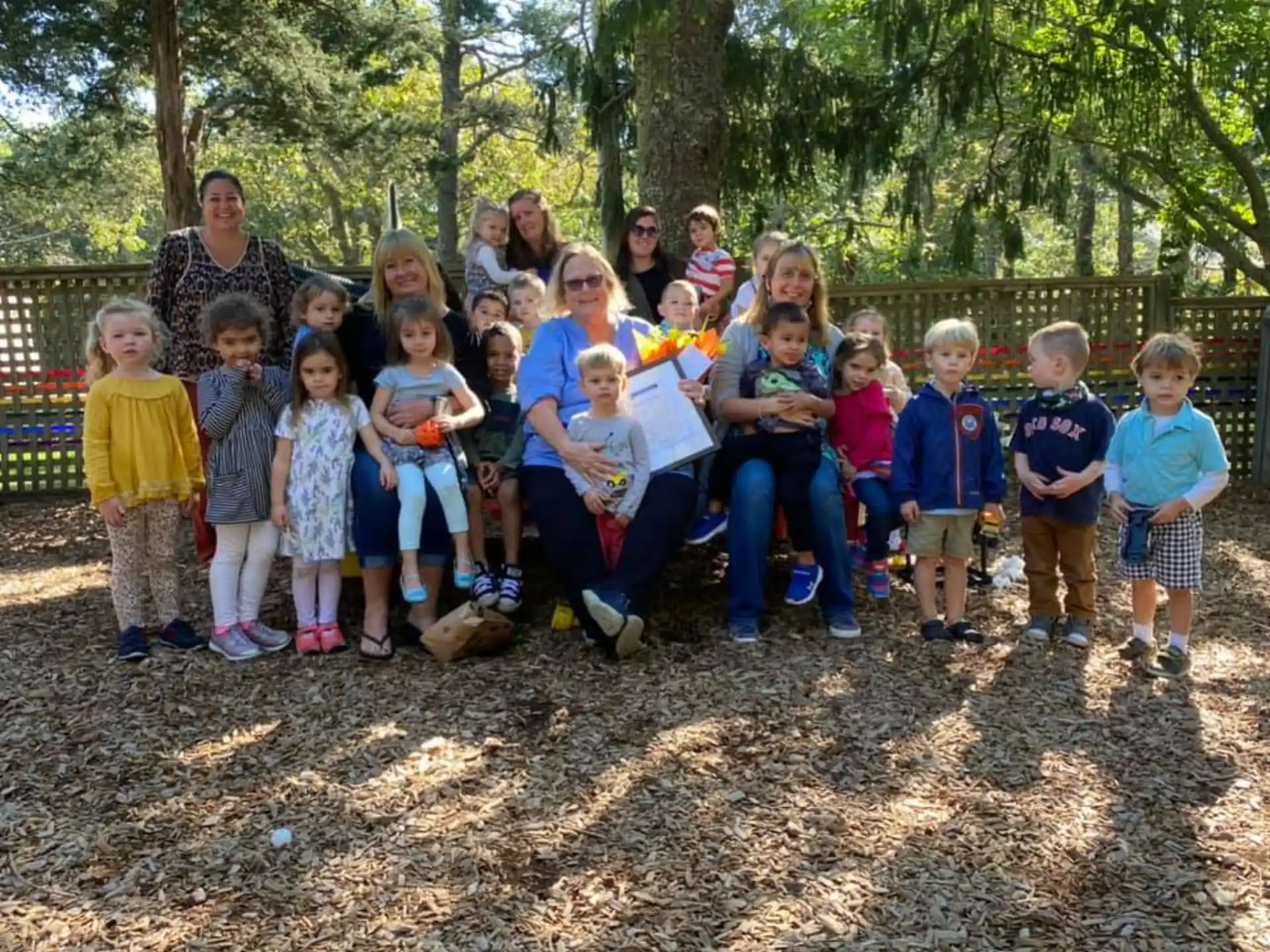 a group of children posing for a photo