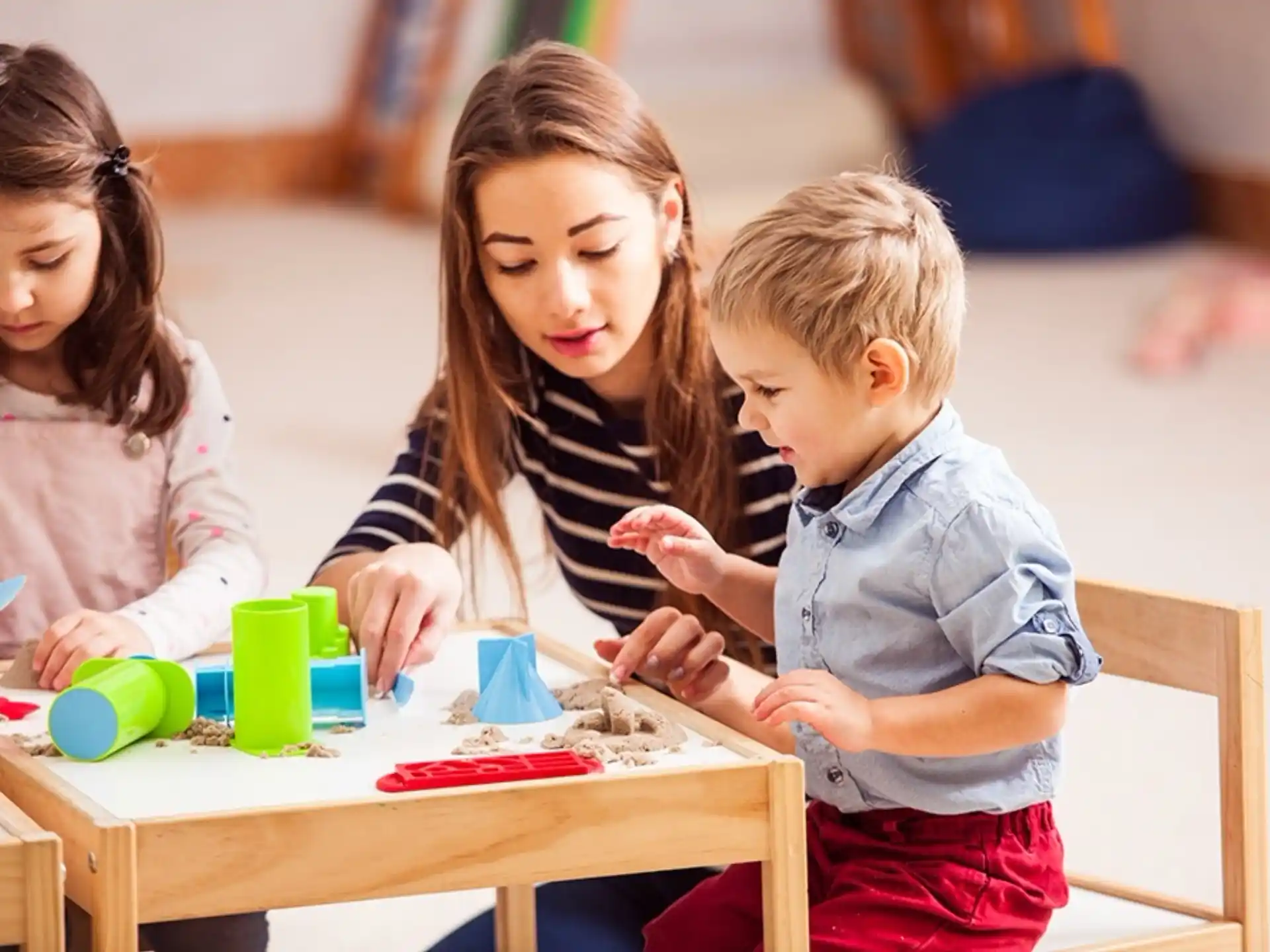 a group of children playing a board game