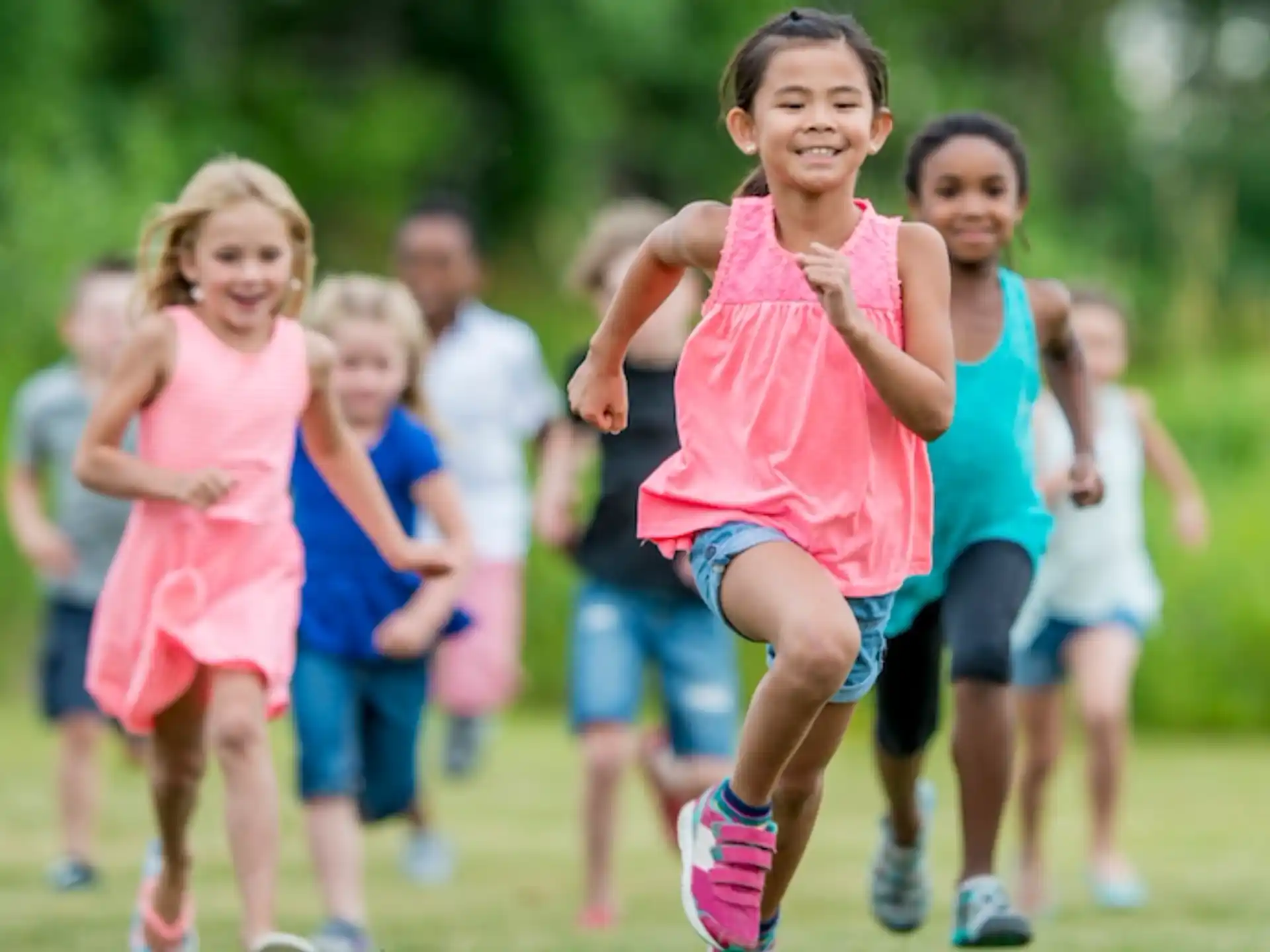 a group of children running