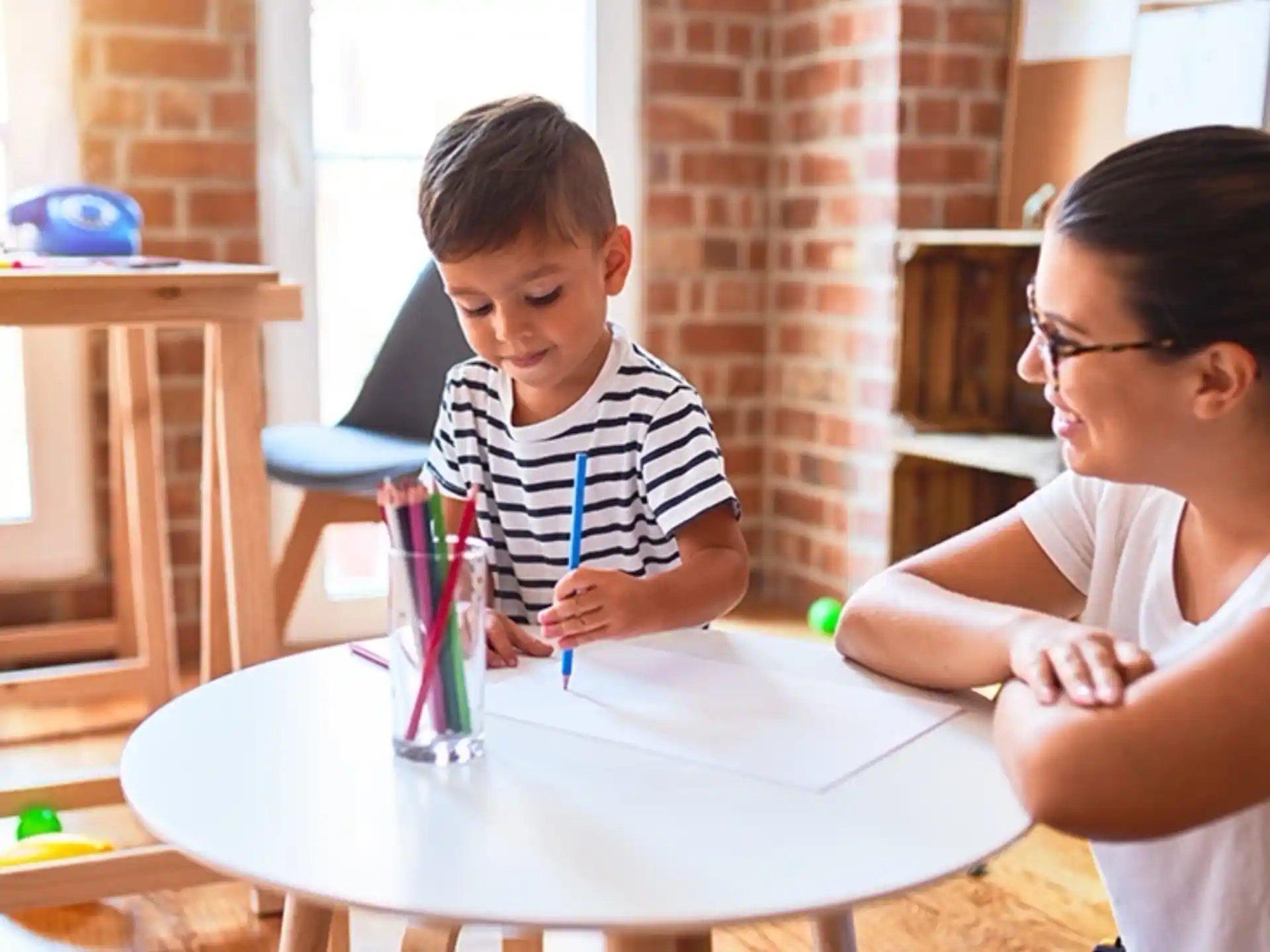 a person and a child playing with toys
