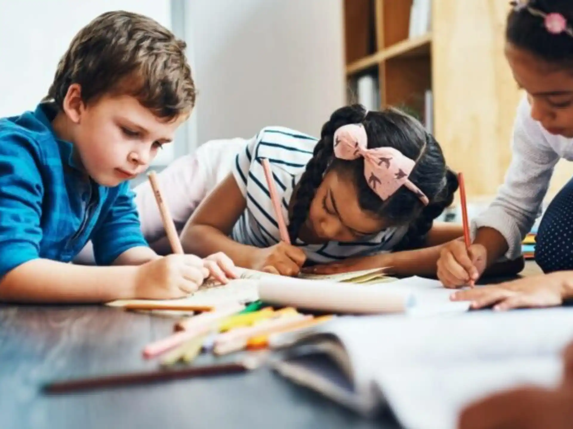 a few children studying together