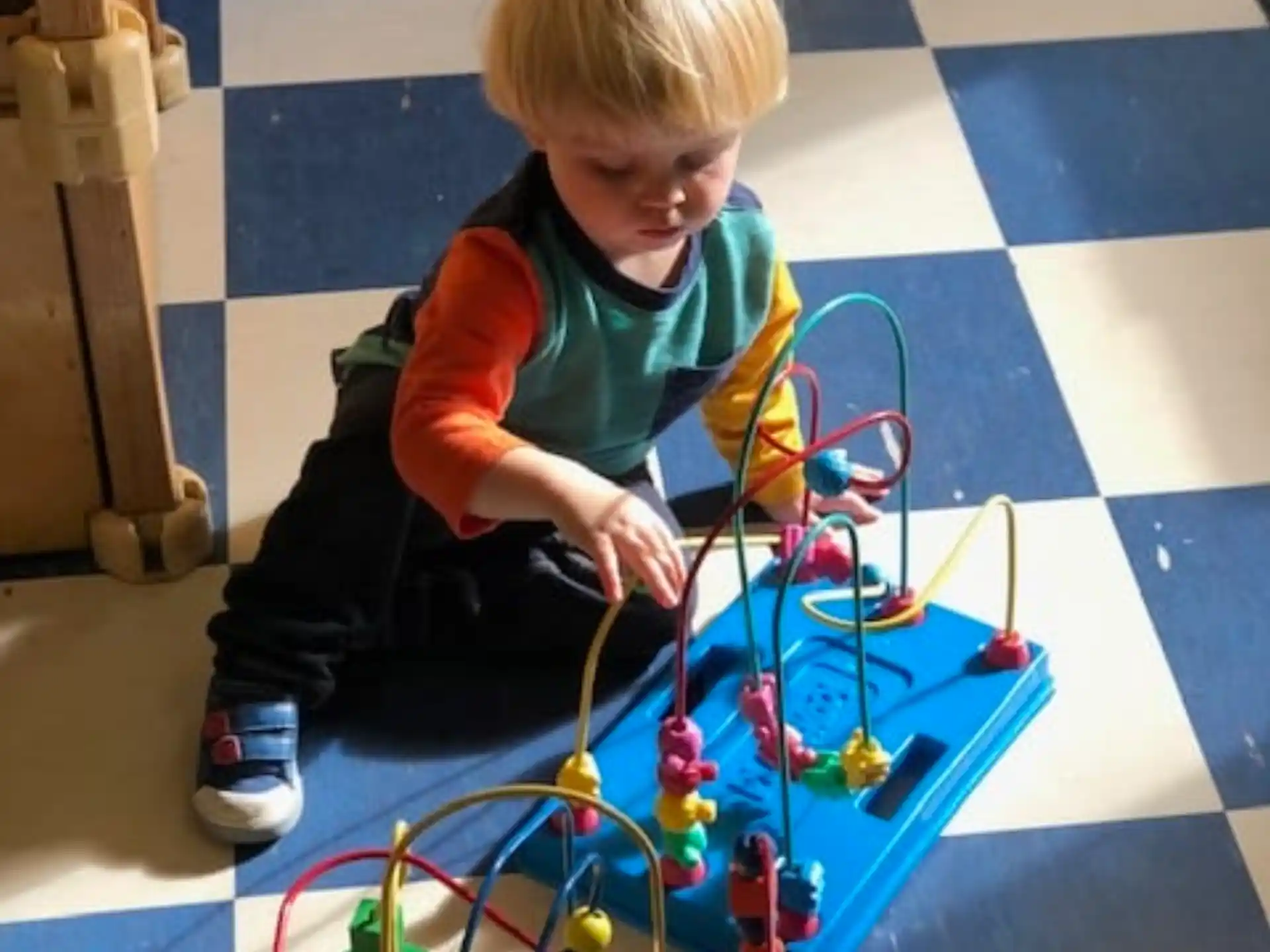 a child playing with a toy