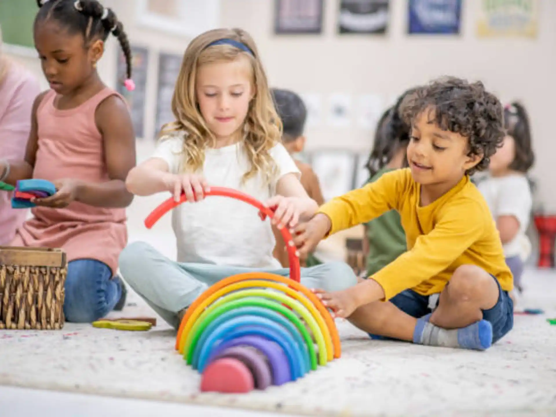 a group of children playing with a toy