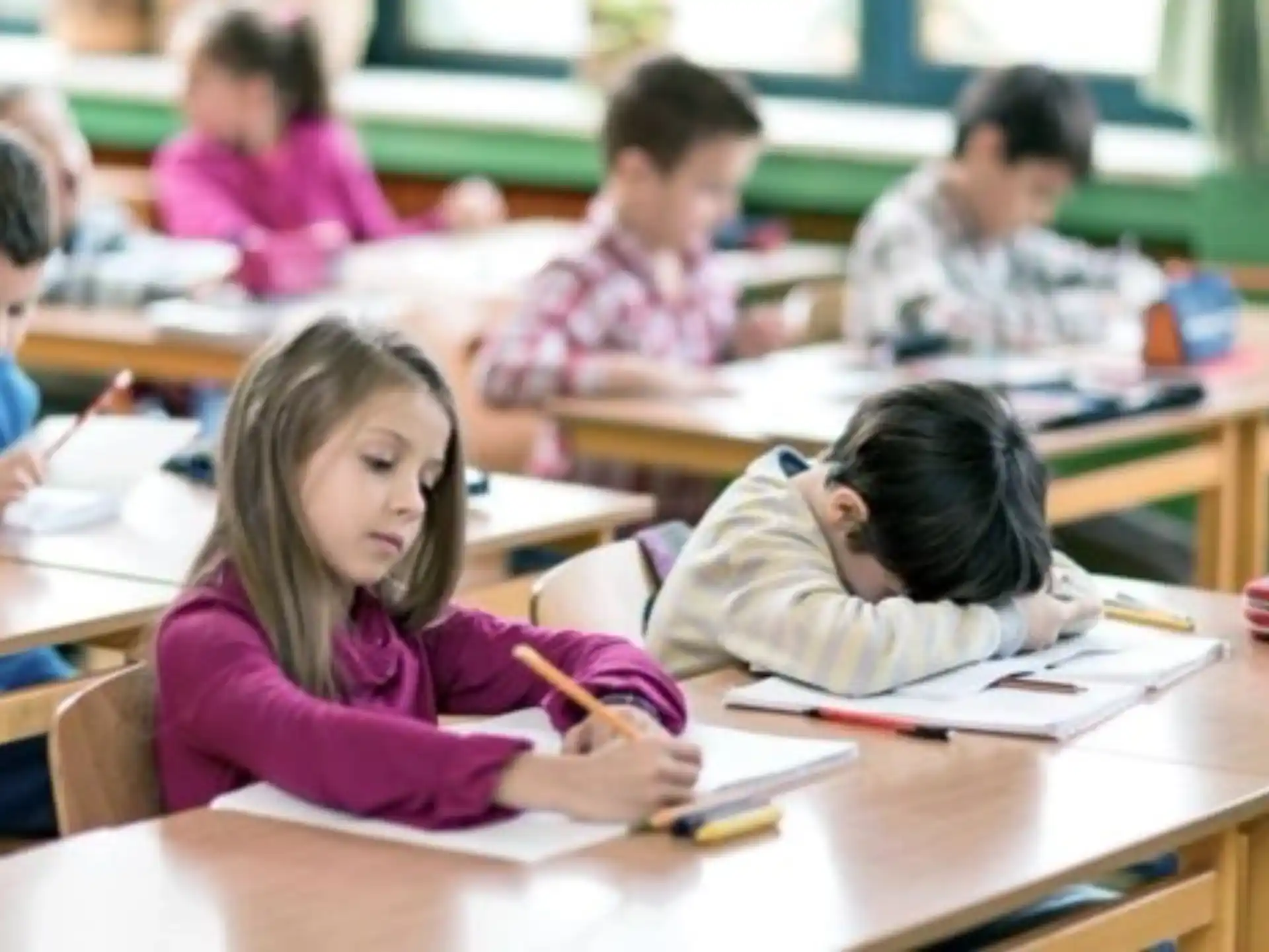 a group of children in a classroom