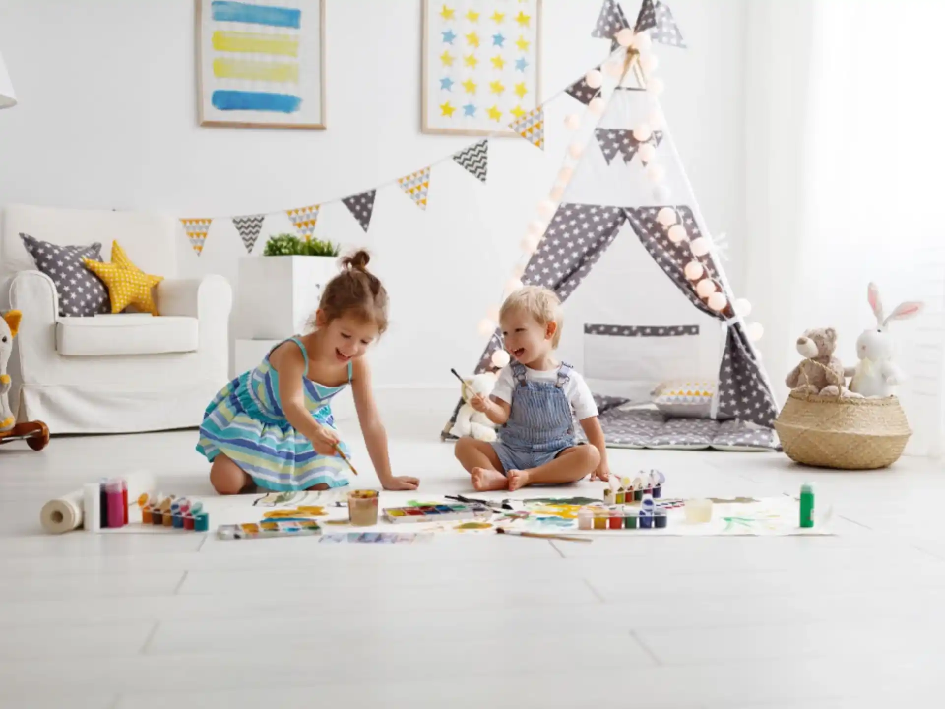 a couple of children playing with toys