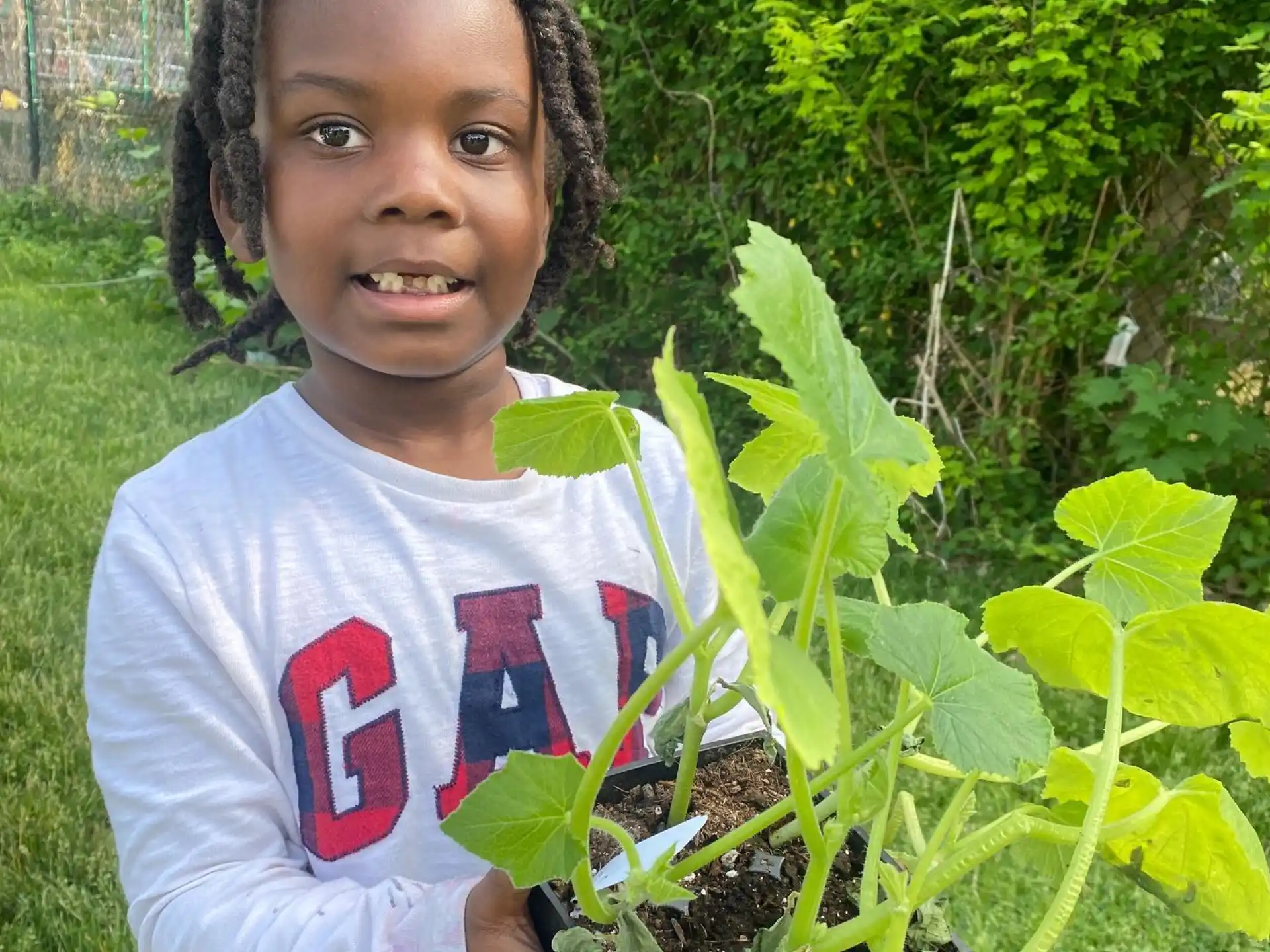 a young girl smiling