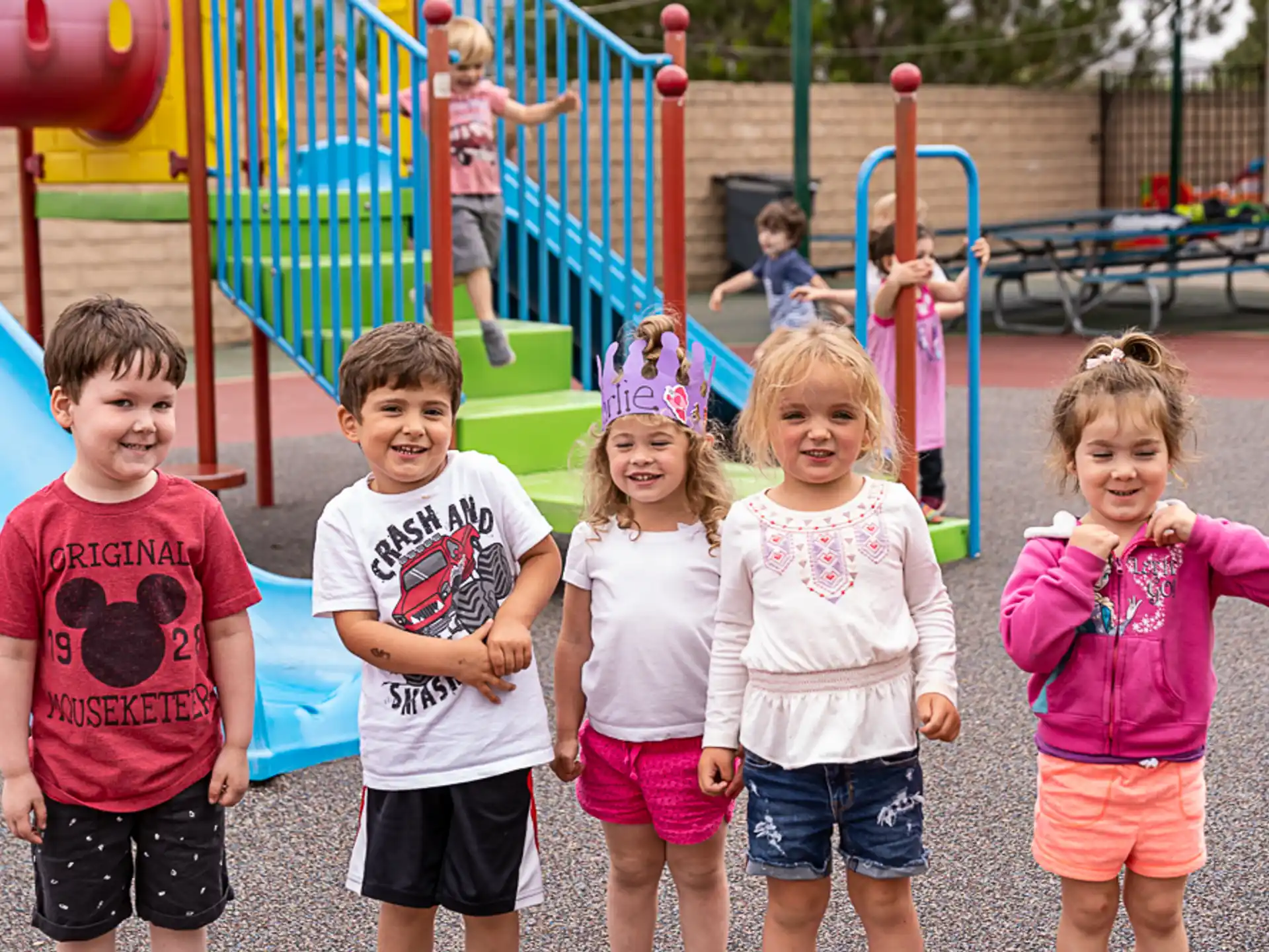 a group of children posing for a photo