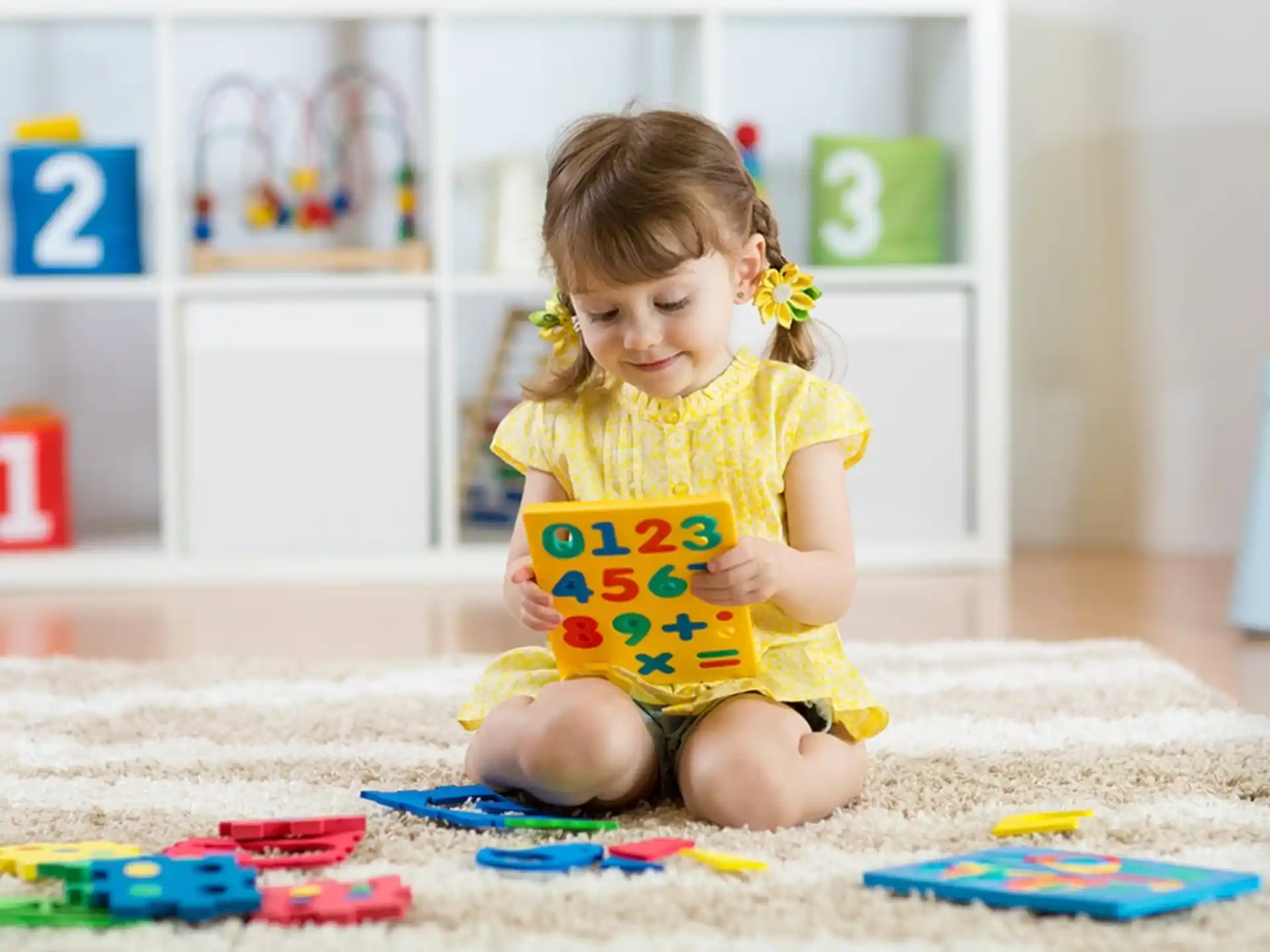 a girl sitting on the floor