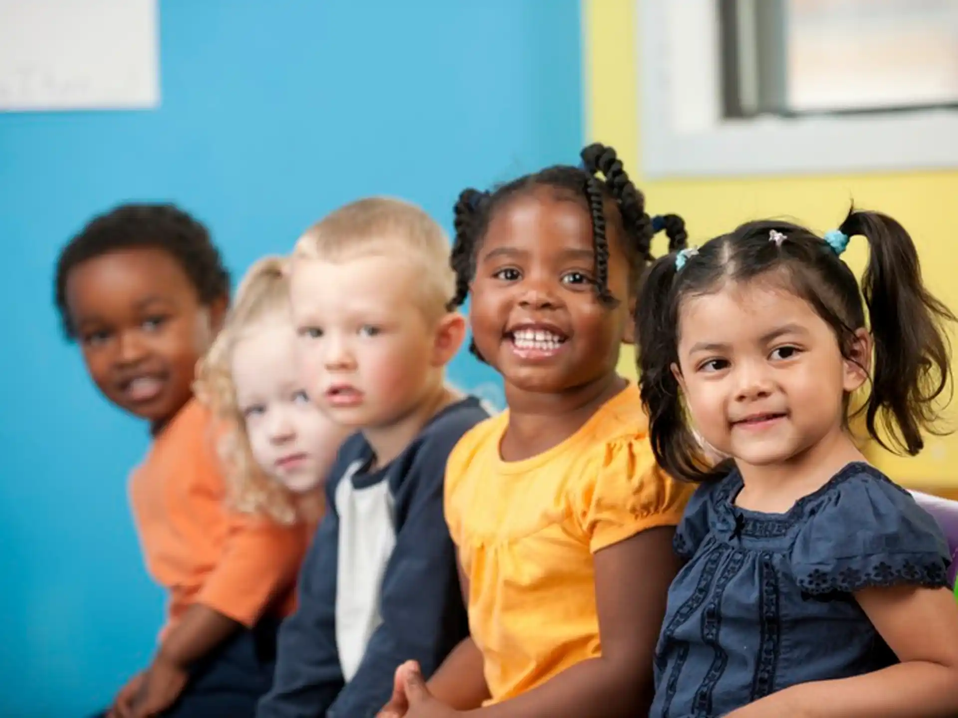 a group of children posing for a photo