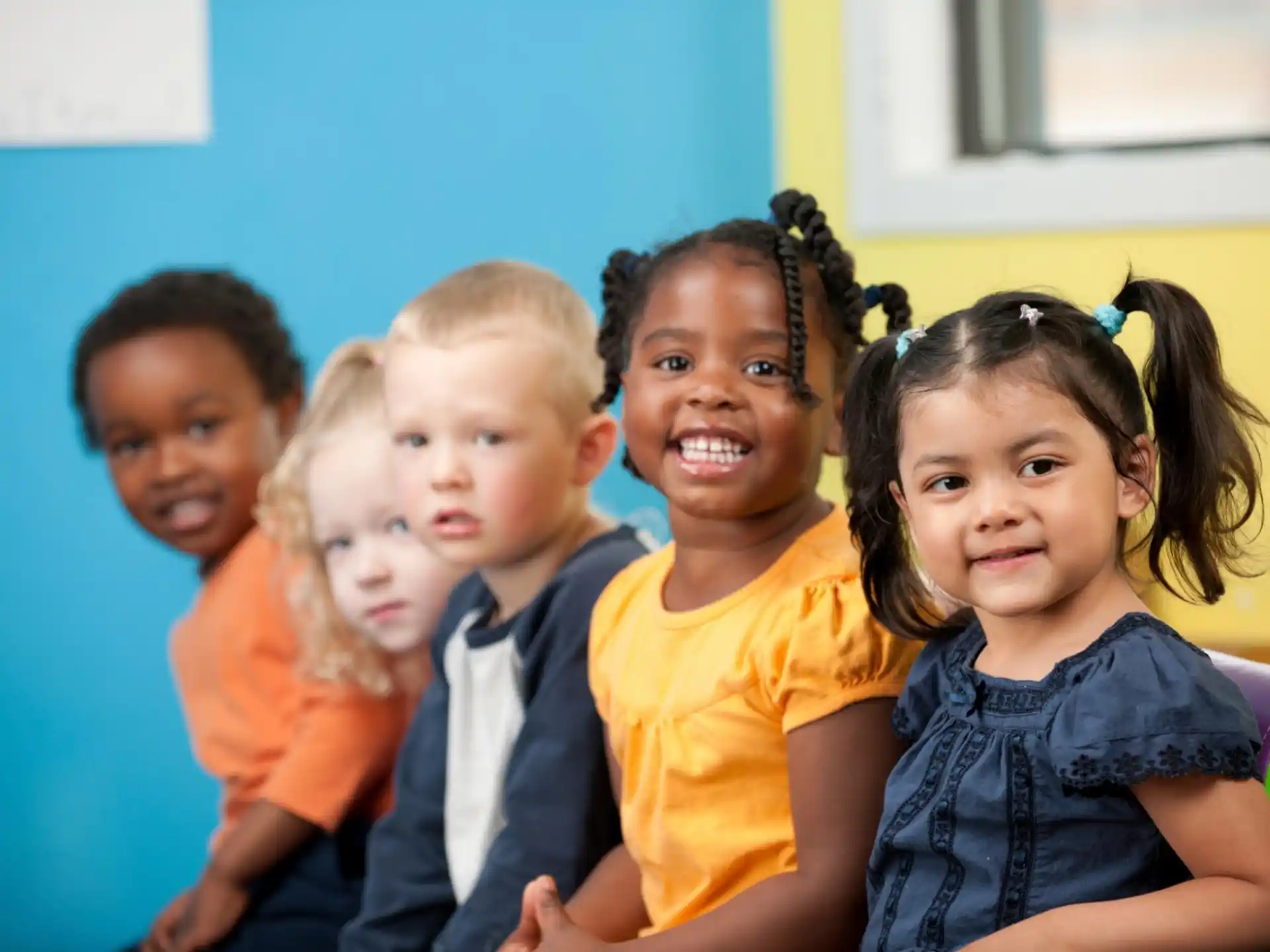 a group of children posing for a photo