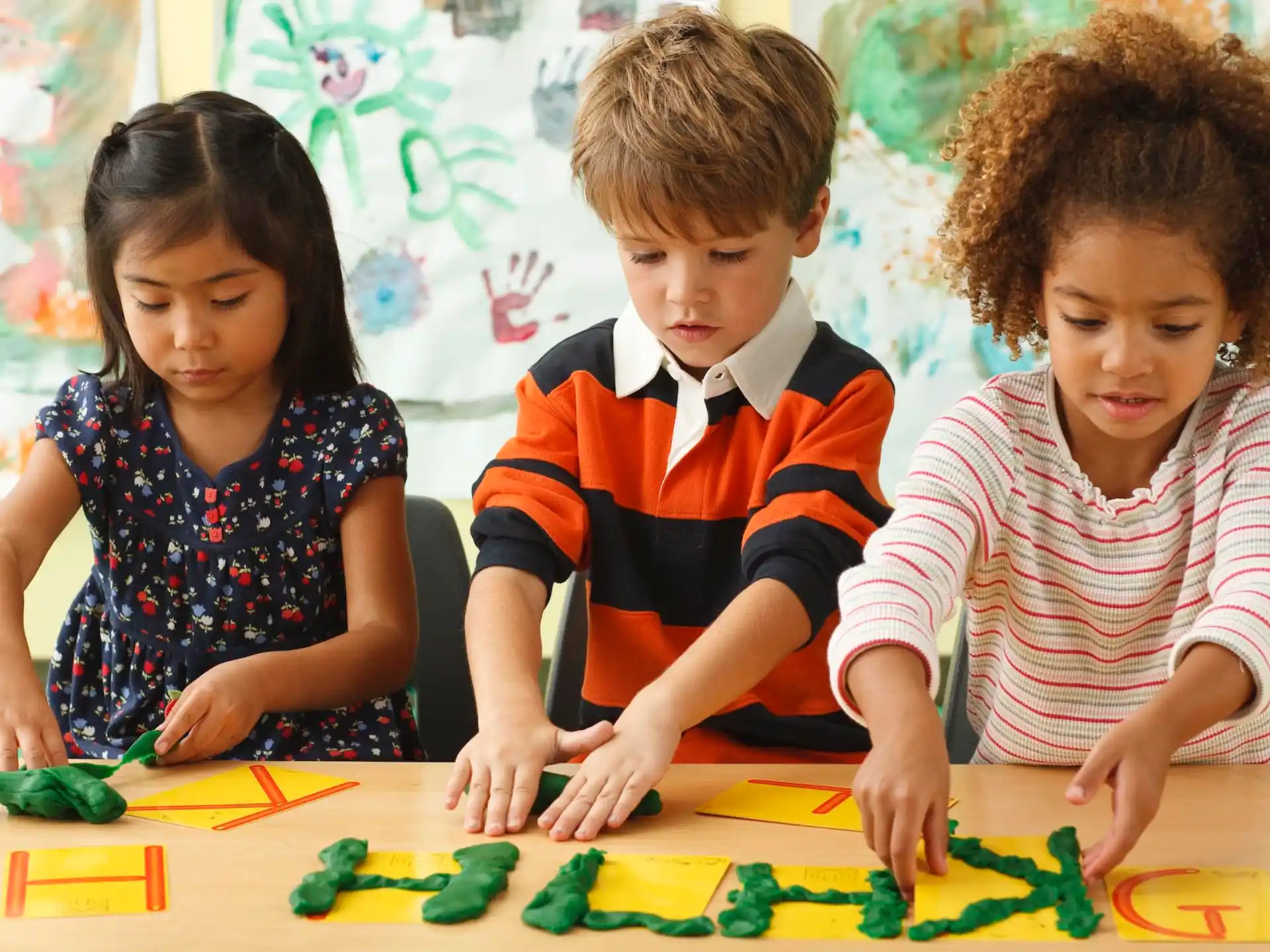 a group of children playing with toys