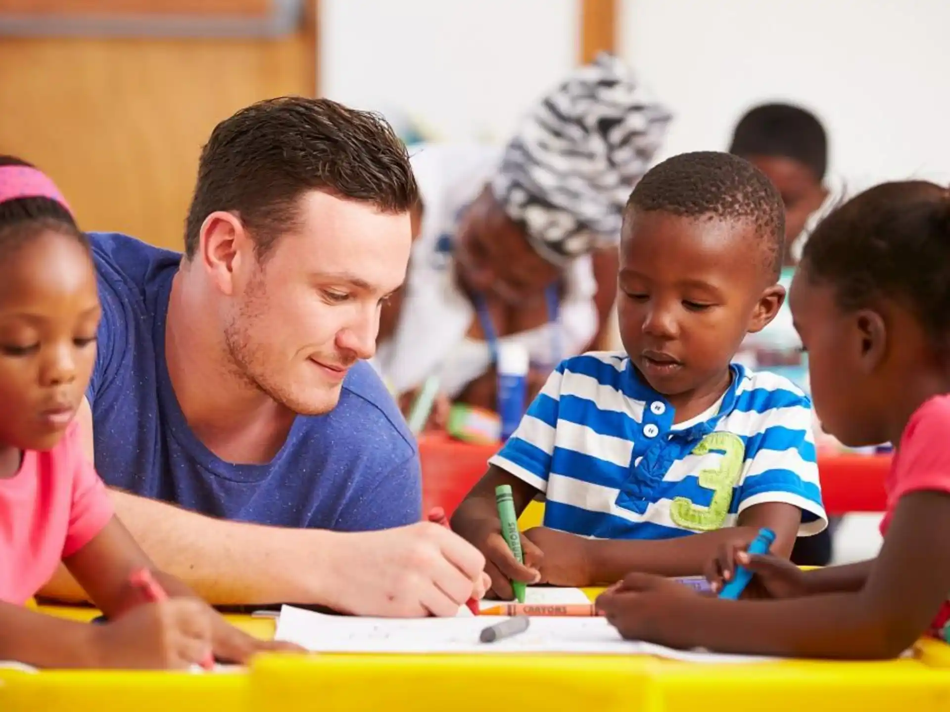 a person and a group of children