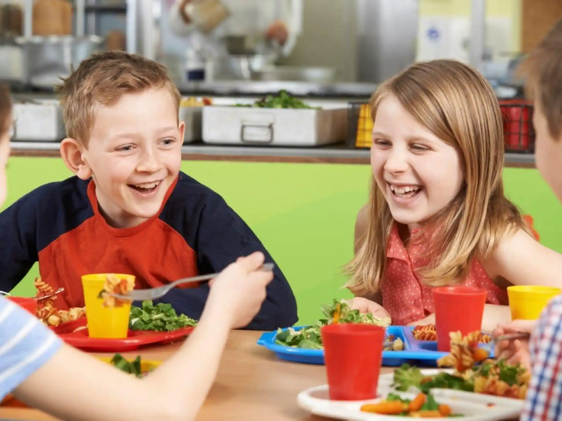 a group of people eating at a table