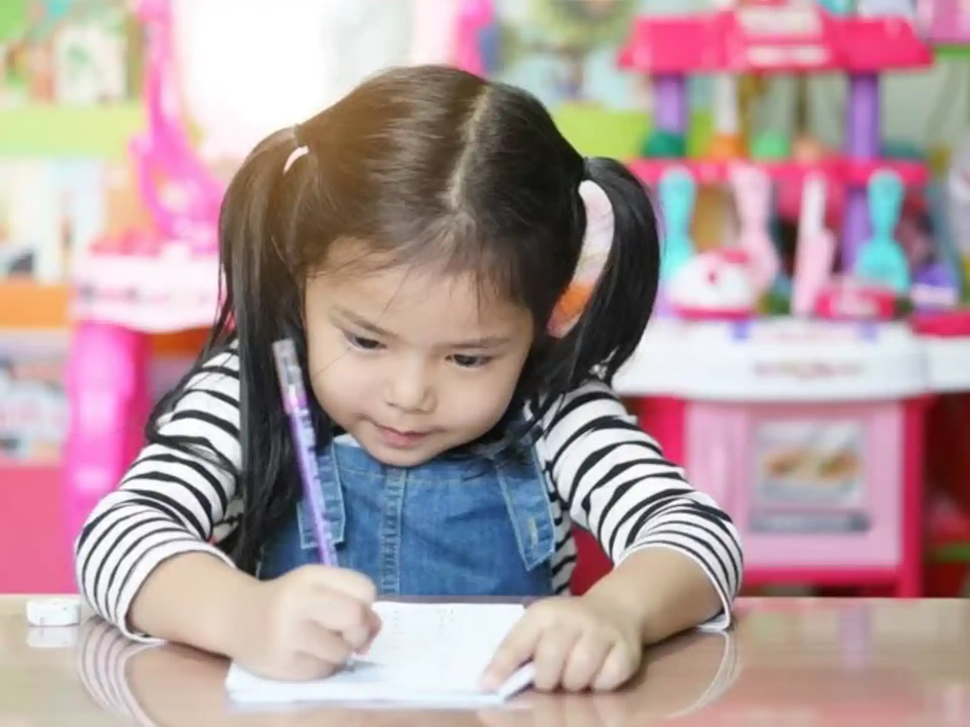 a young girl with a stethoscope on her head