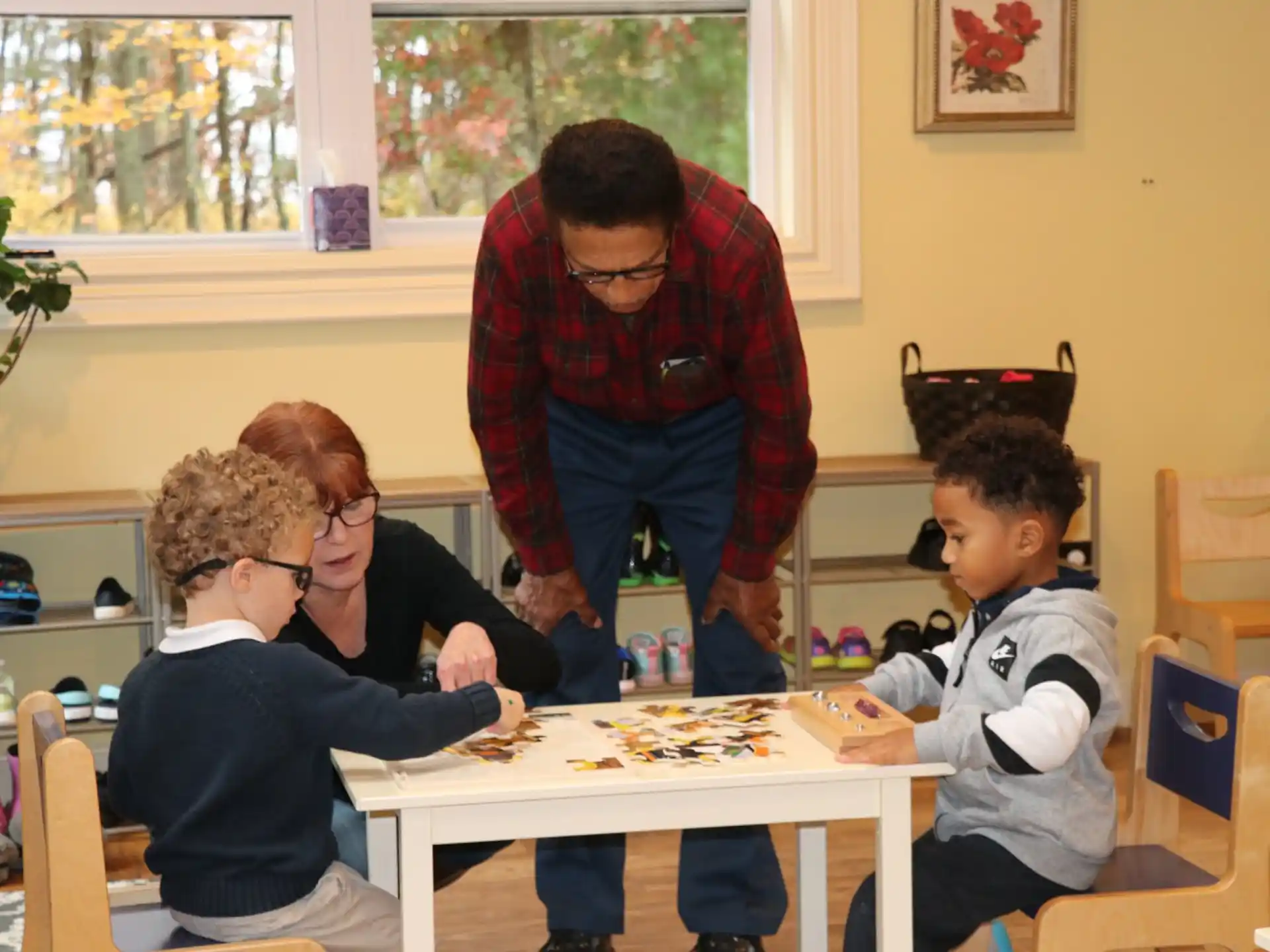 a group of people playing a board game