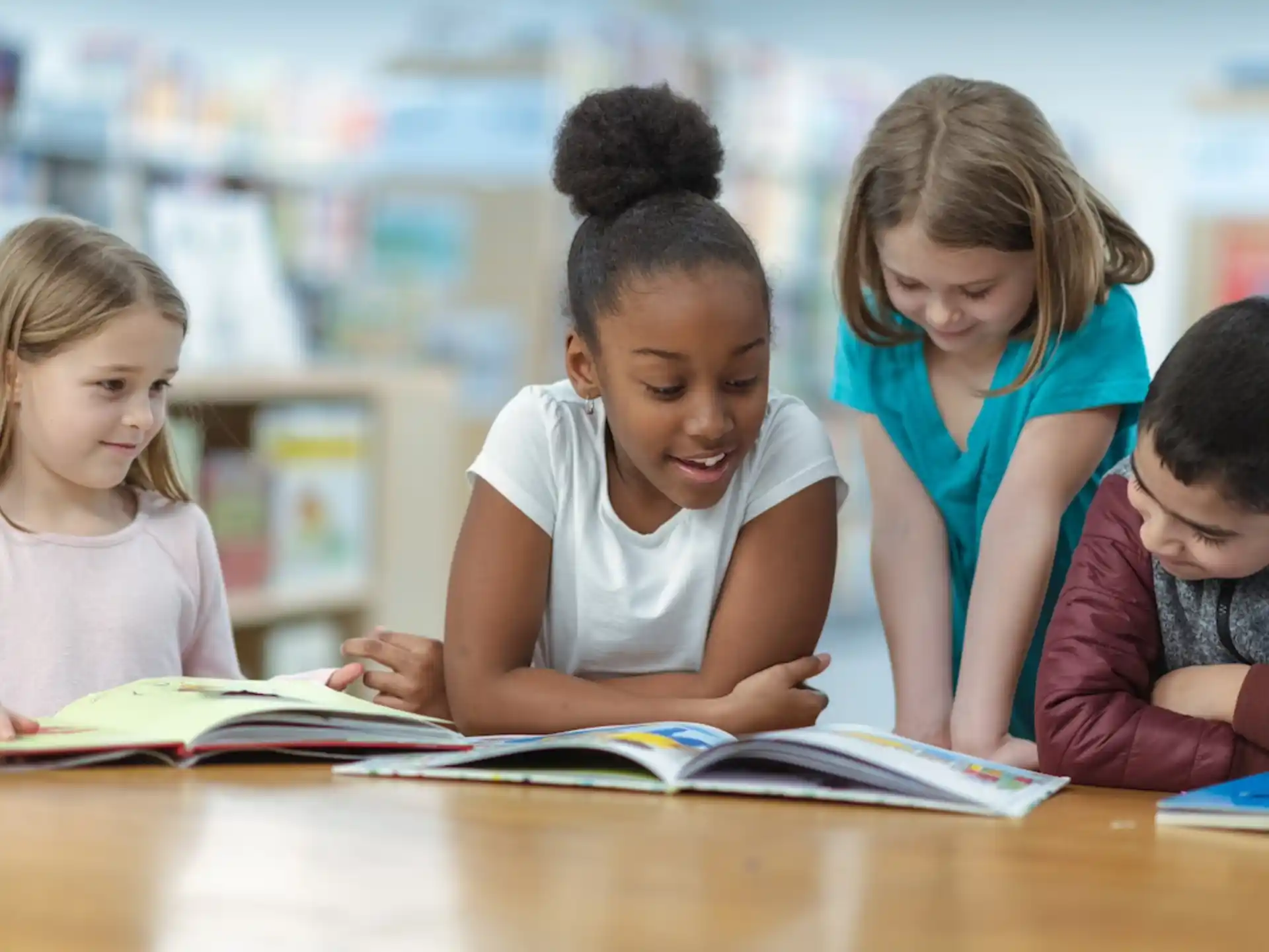 a group of children studying
