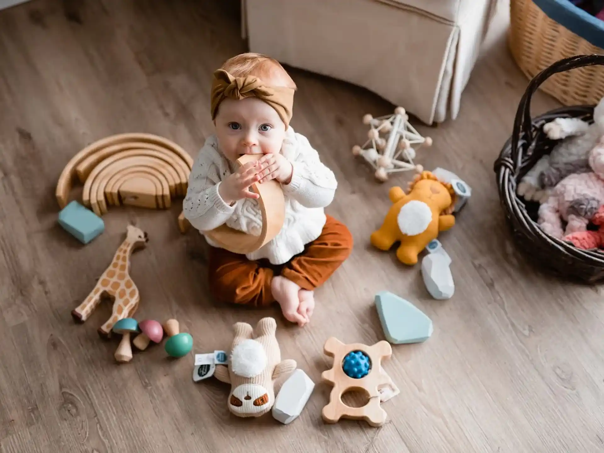 a baby sitting on the floor