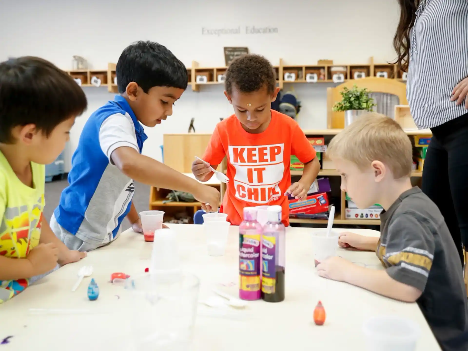 a group of children playing with toys