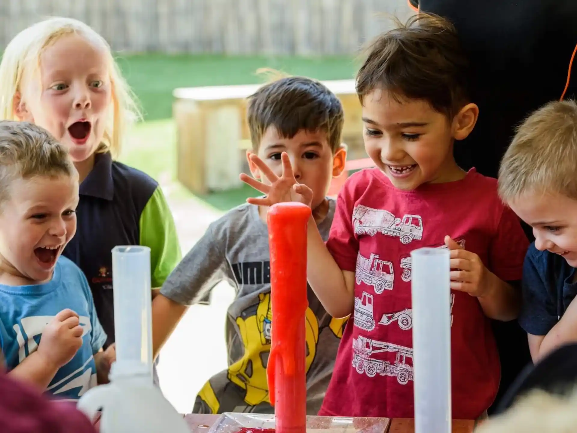 a group of kids playing with a toy