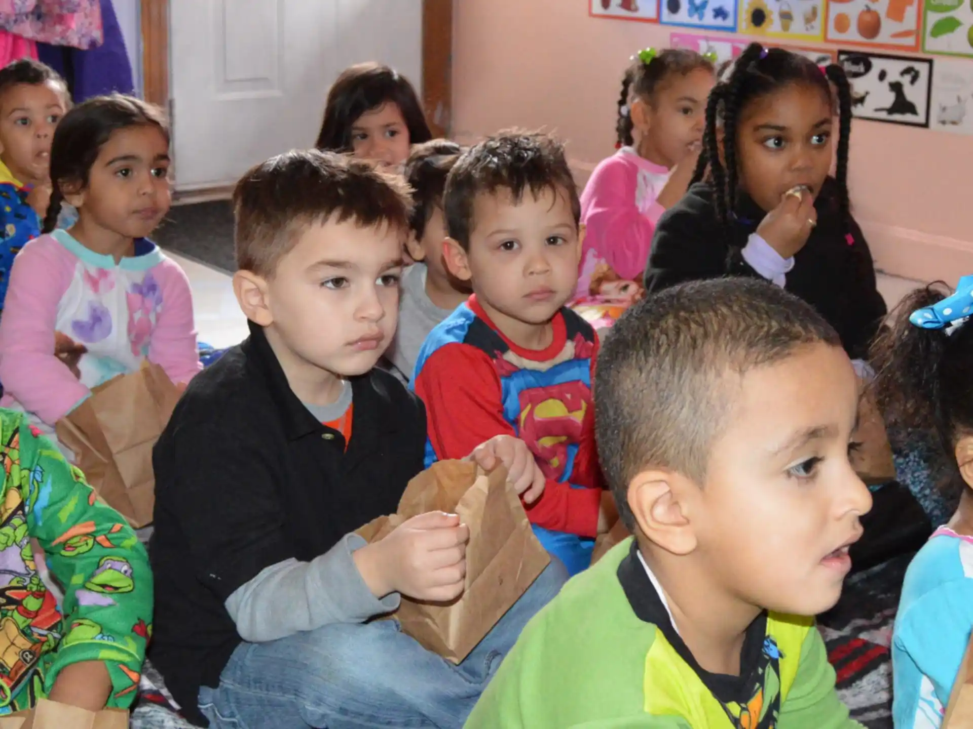 a group of children in a classroom