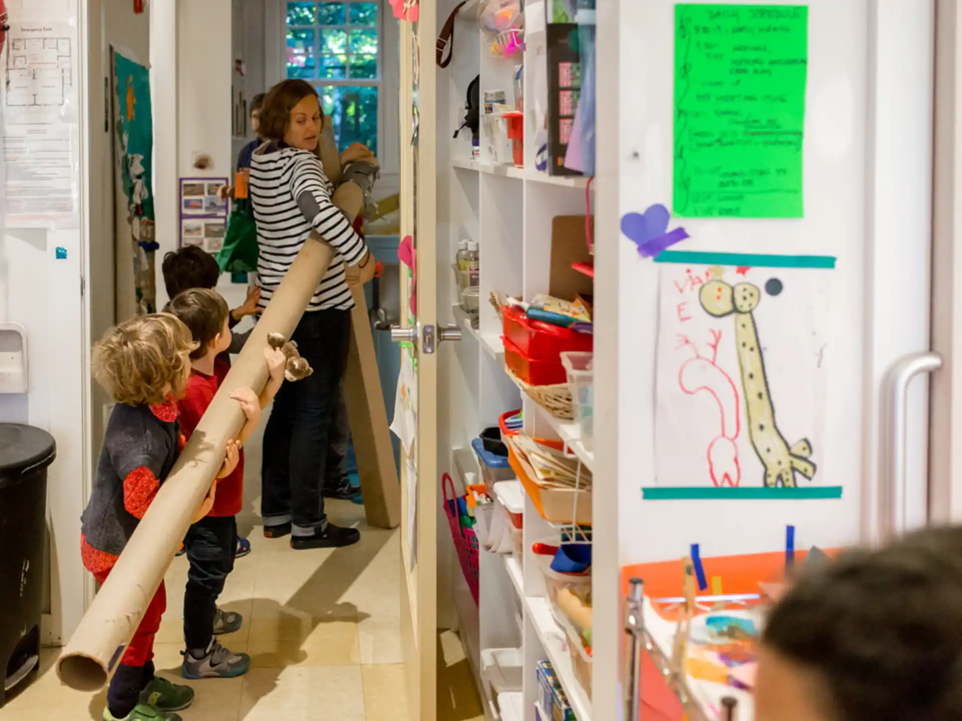 a person teaching children in a classroom