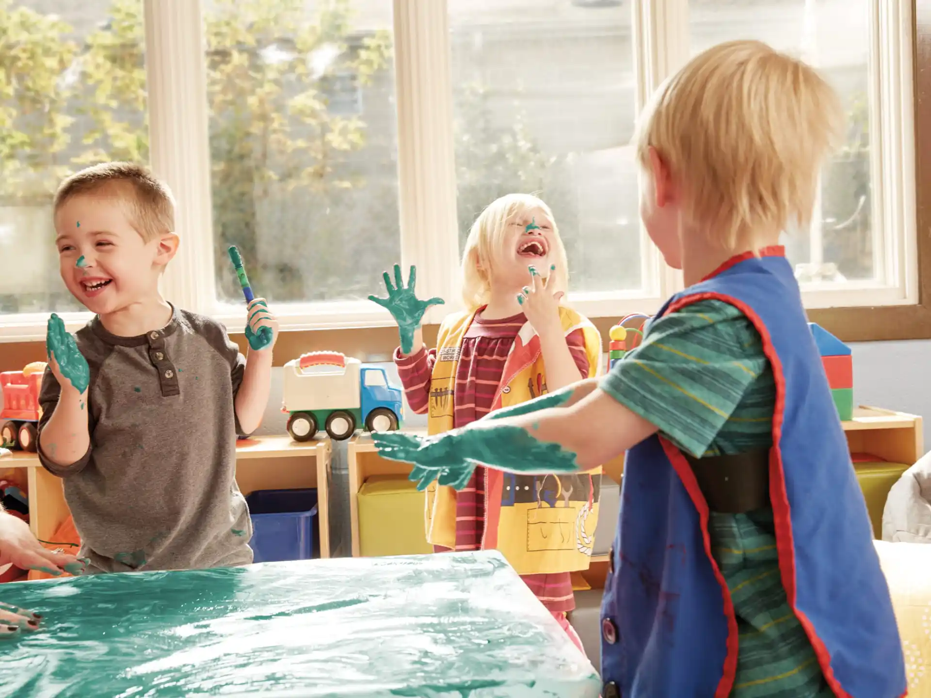 a group of kids playing with toys
