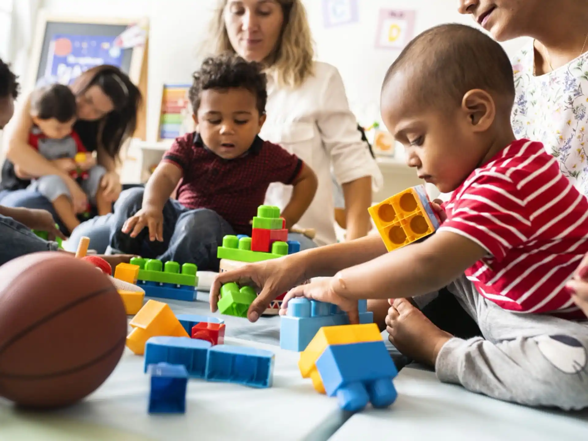 a group of children playing with toys