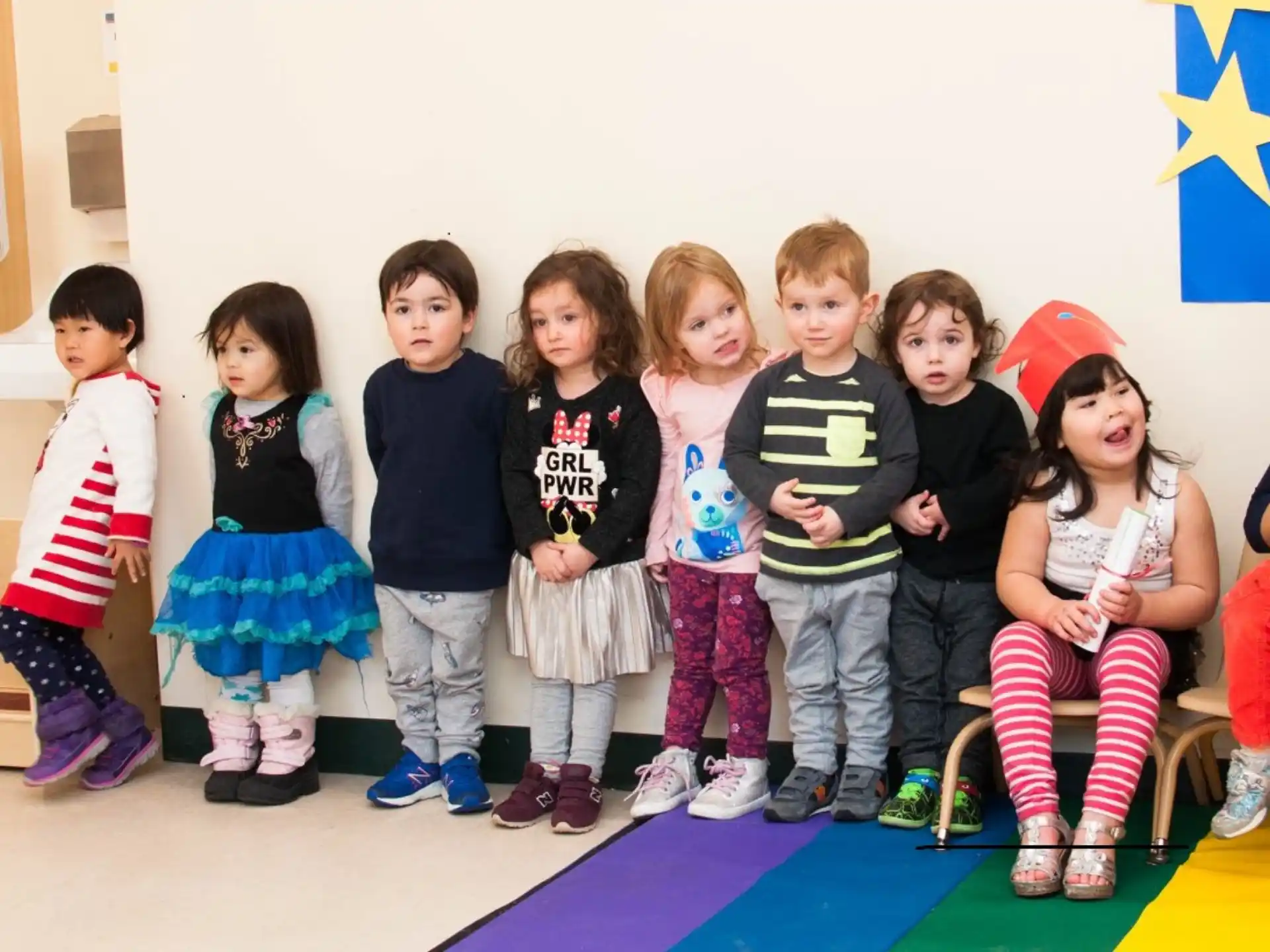 a group of children posing for a photo