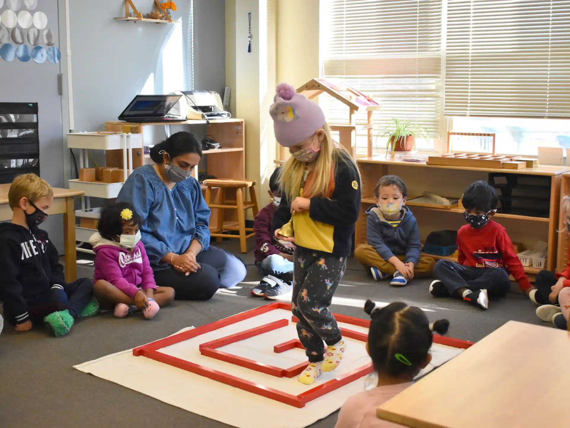 a group of children sitting on the floor