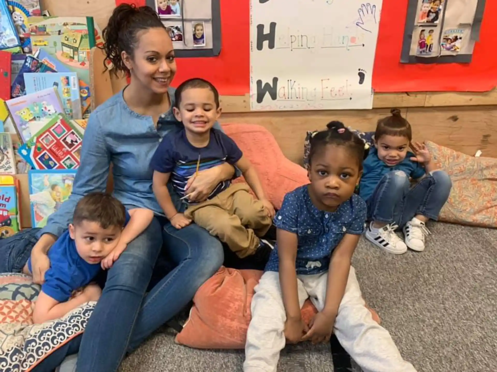 a group of children sitting on a couch