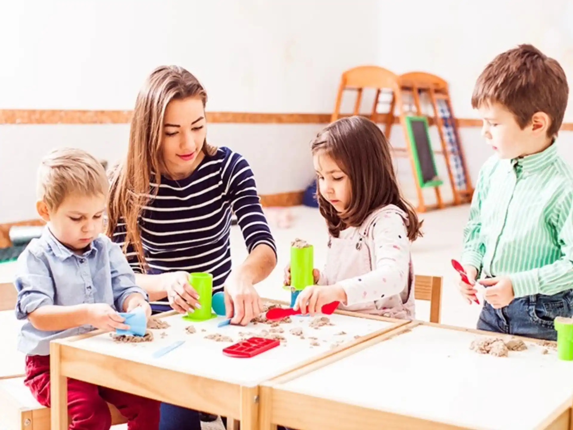 a group of children playing with toys