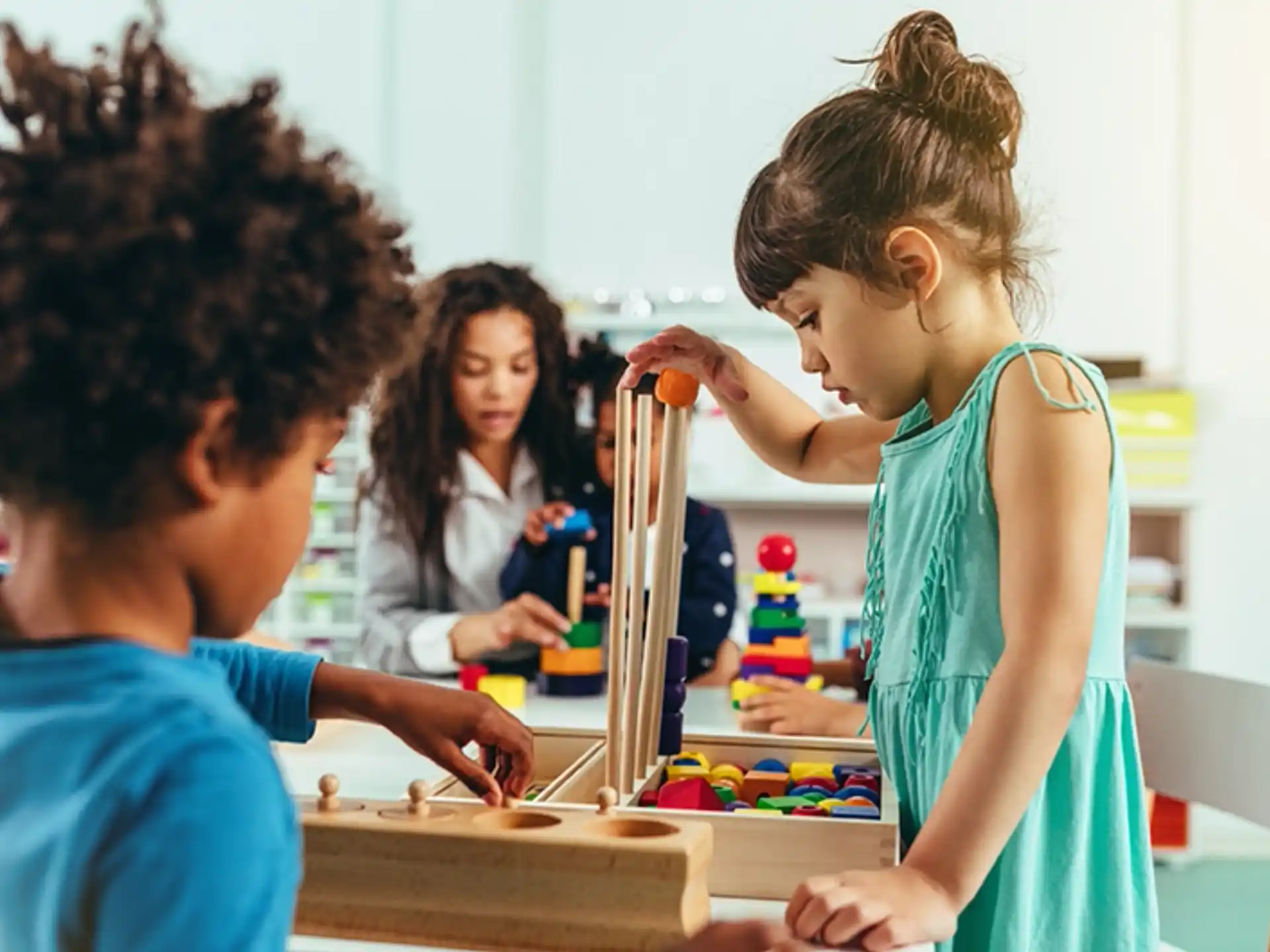 a group of children playing with toys