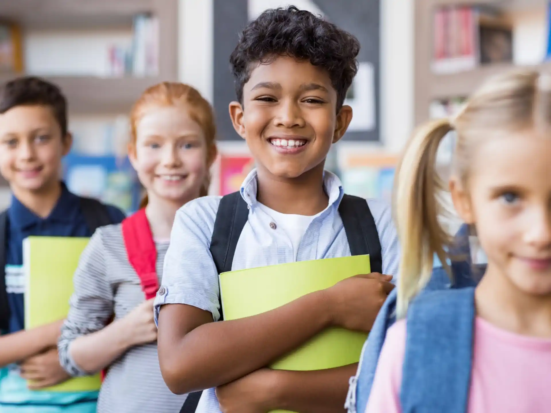 a group of children smiling
